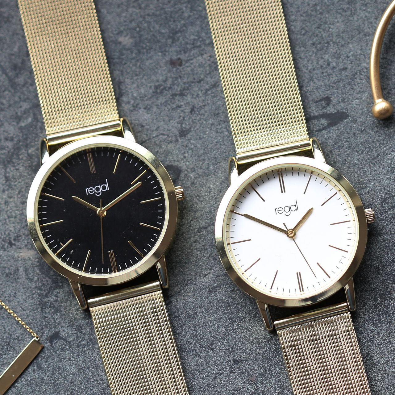 Regal mesh horloge met goudkleurige band