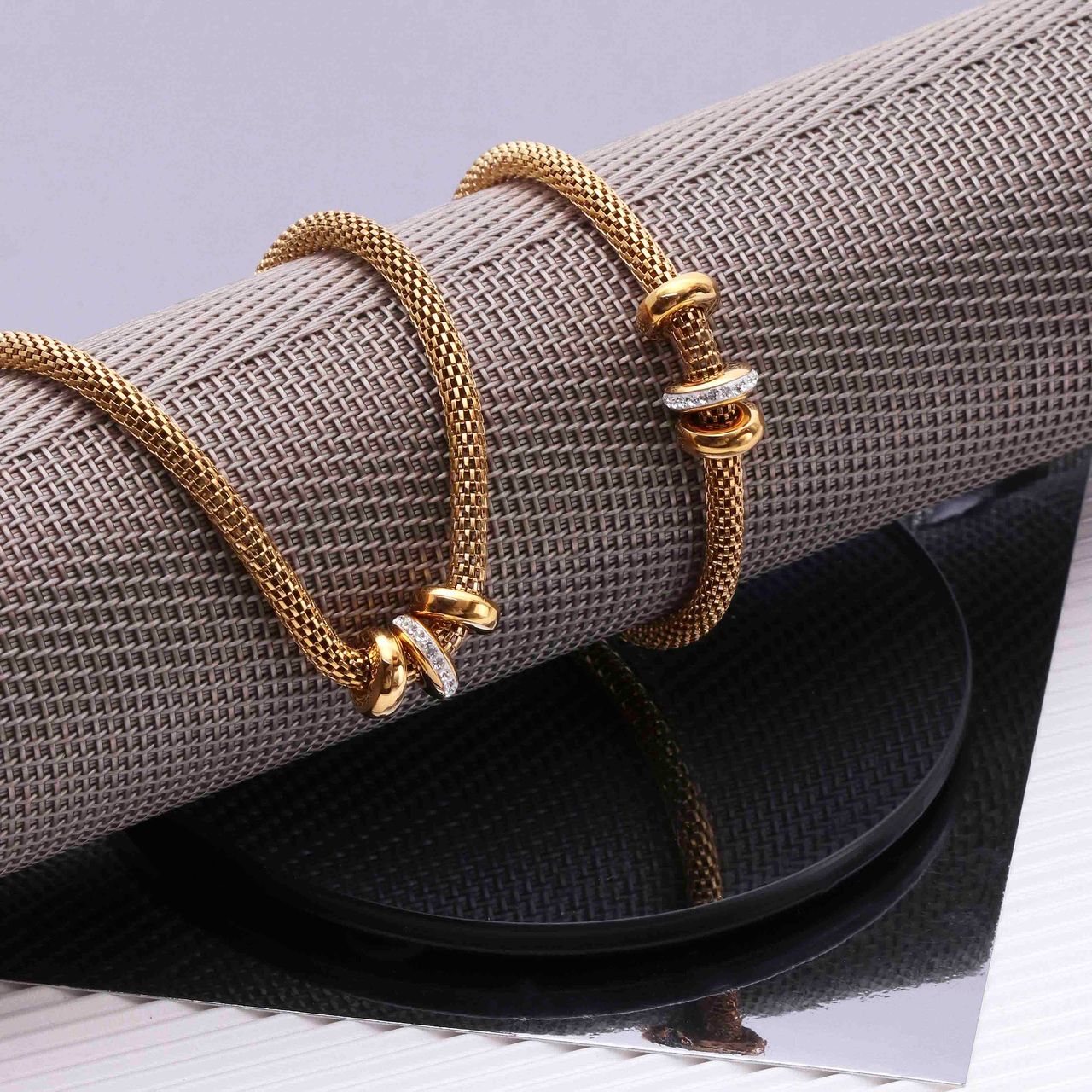 Gerecycleerd stainless steel goldplated ketting&armband 3ringen kristal