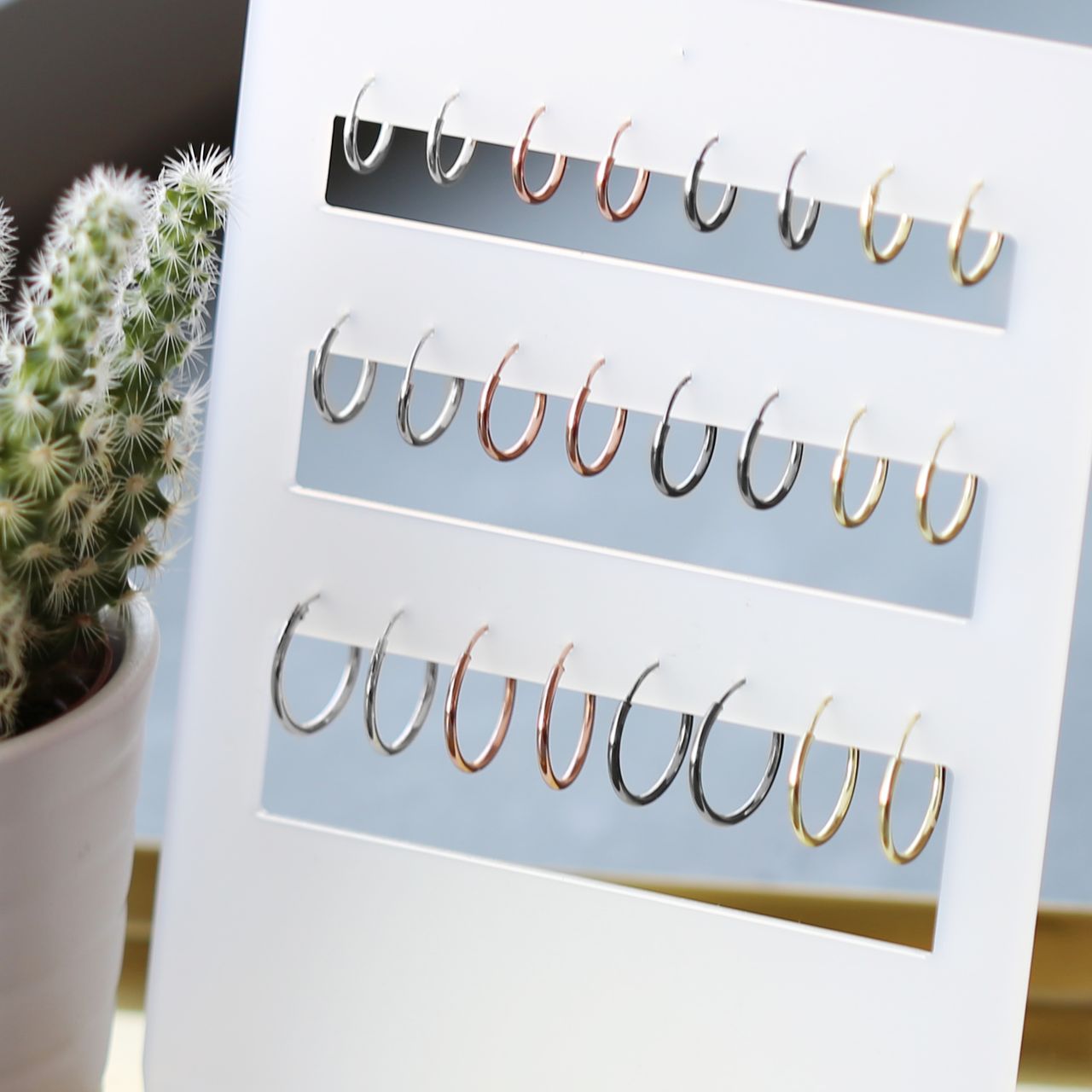 Zilveren oorbellen roseplated 12mm