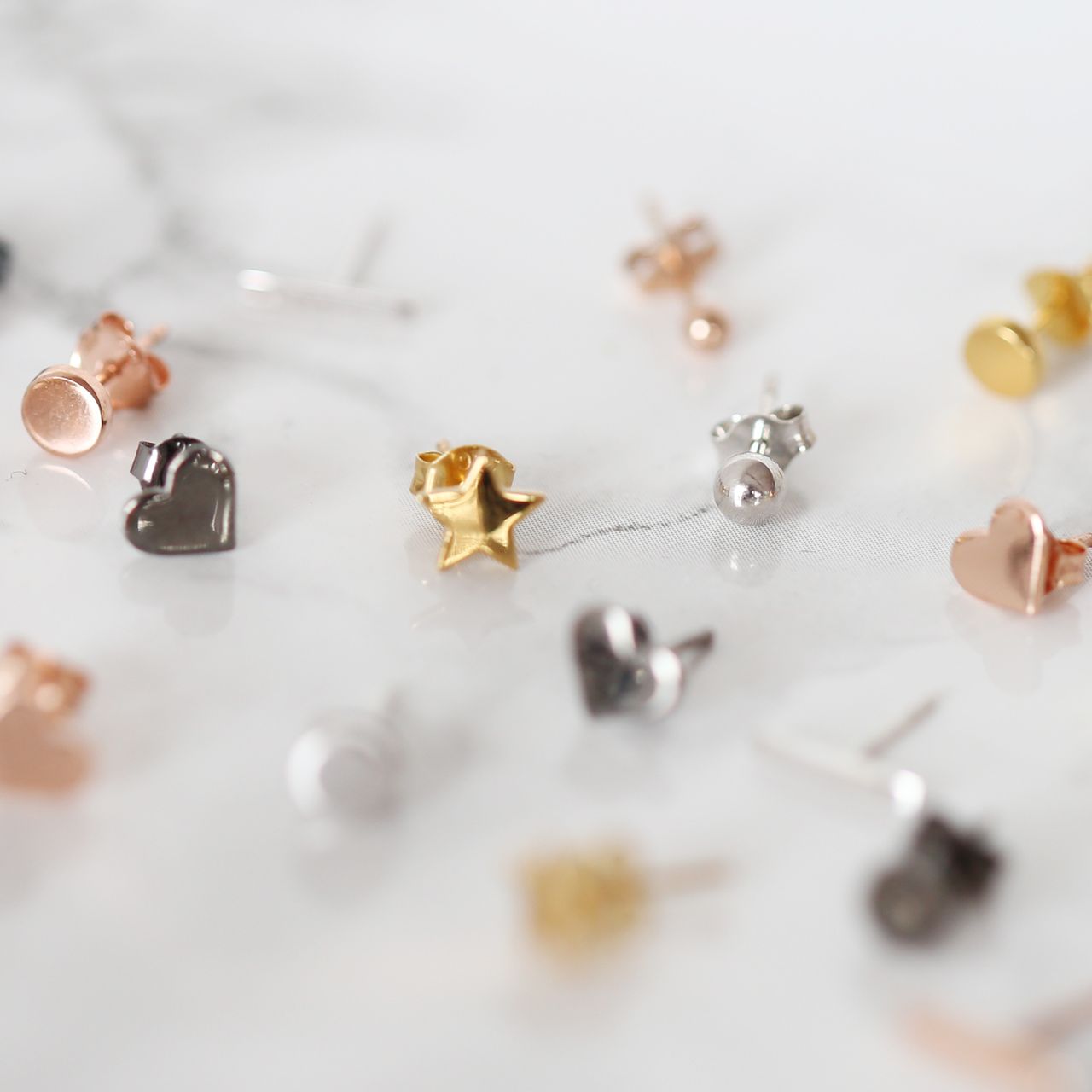 Zilveren goldplated oorknoppen ster voor dames