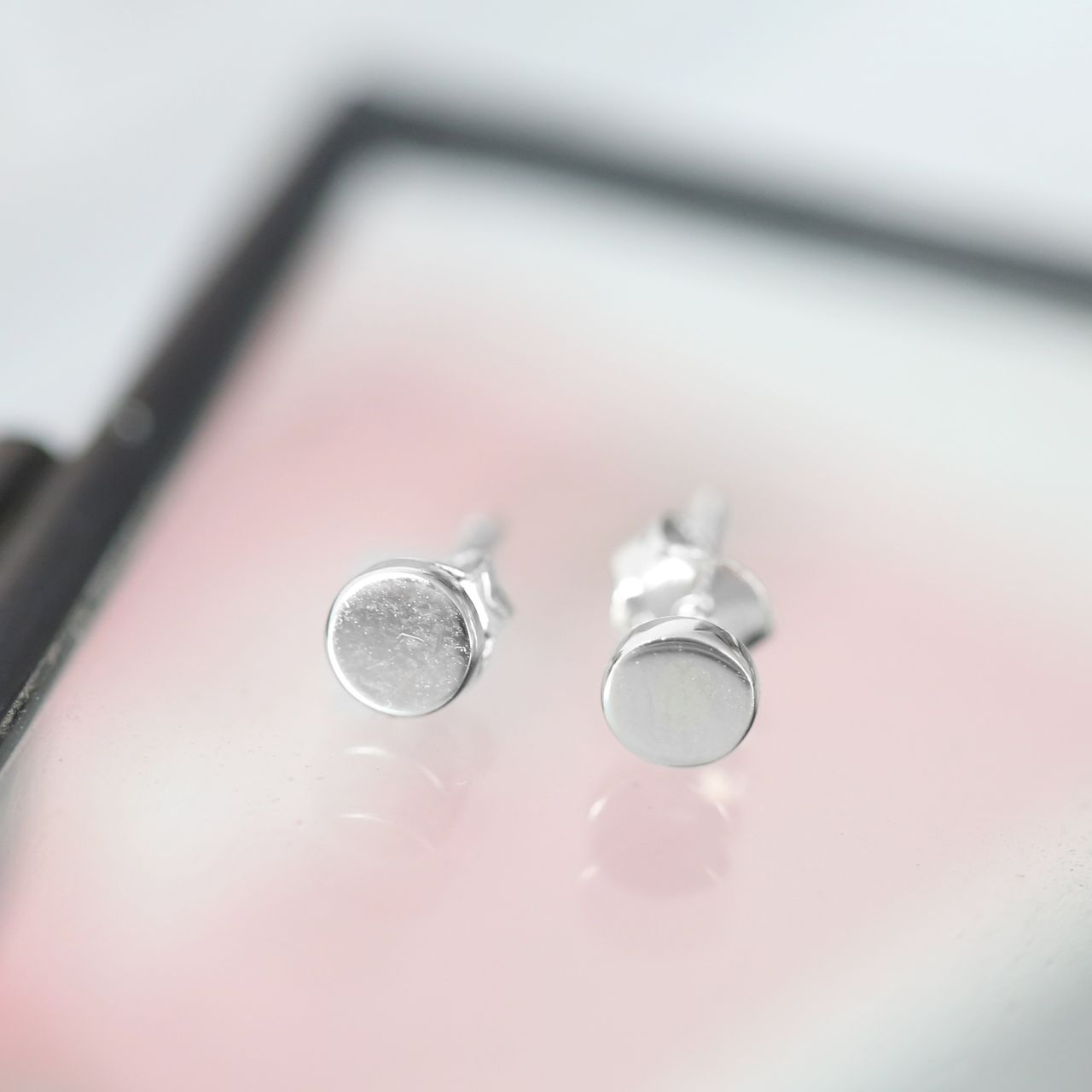 Zilveren oorknoppen rhodiumplated rond 5mm voor dames