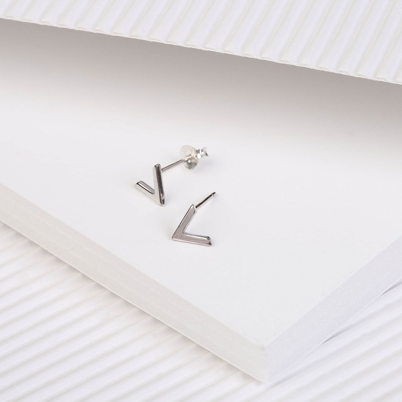 Zilveren oorknoppen rhodiumplated v voor dames