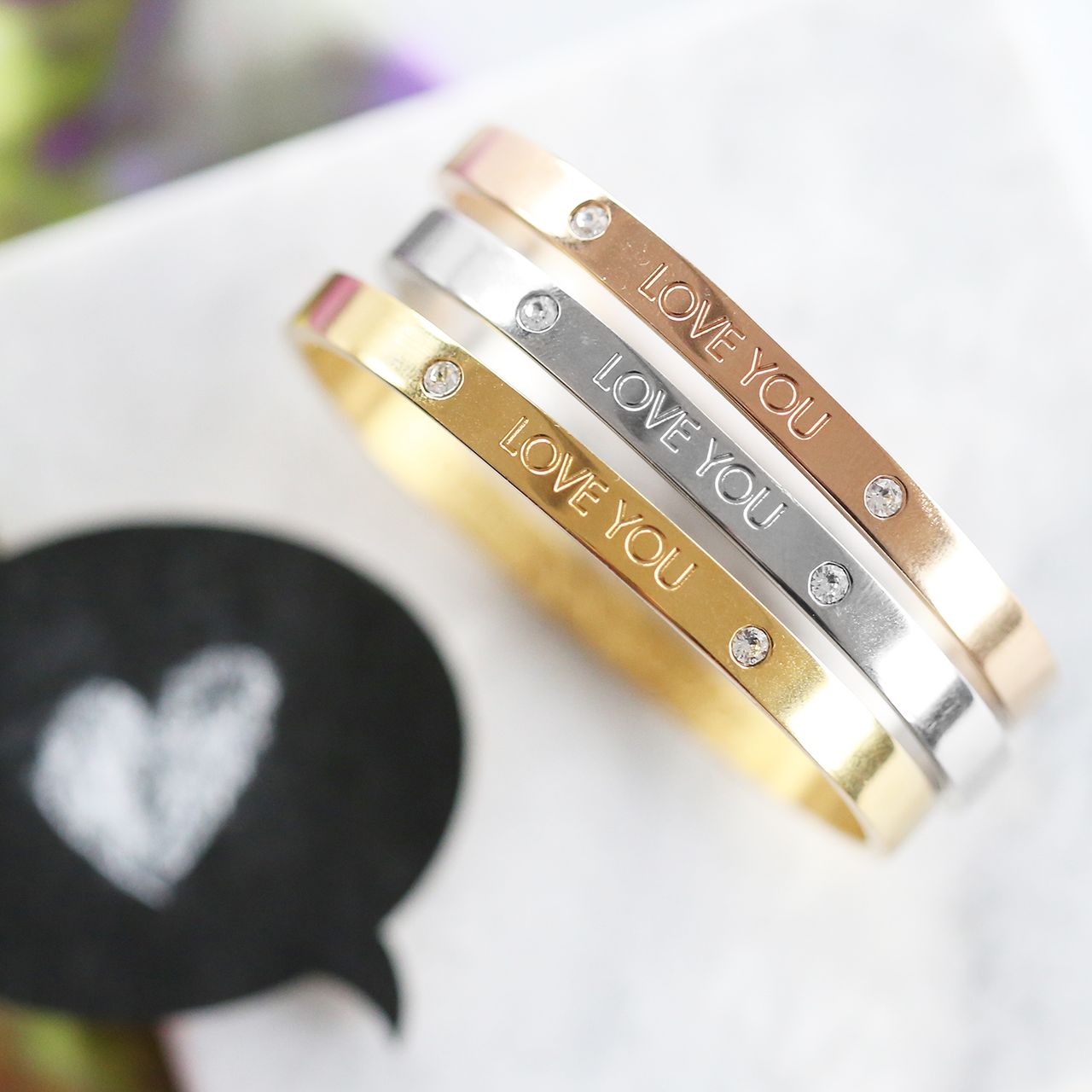 Guess stalen armband bangle goldplated Love you