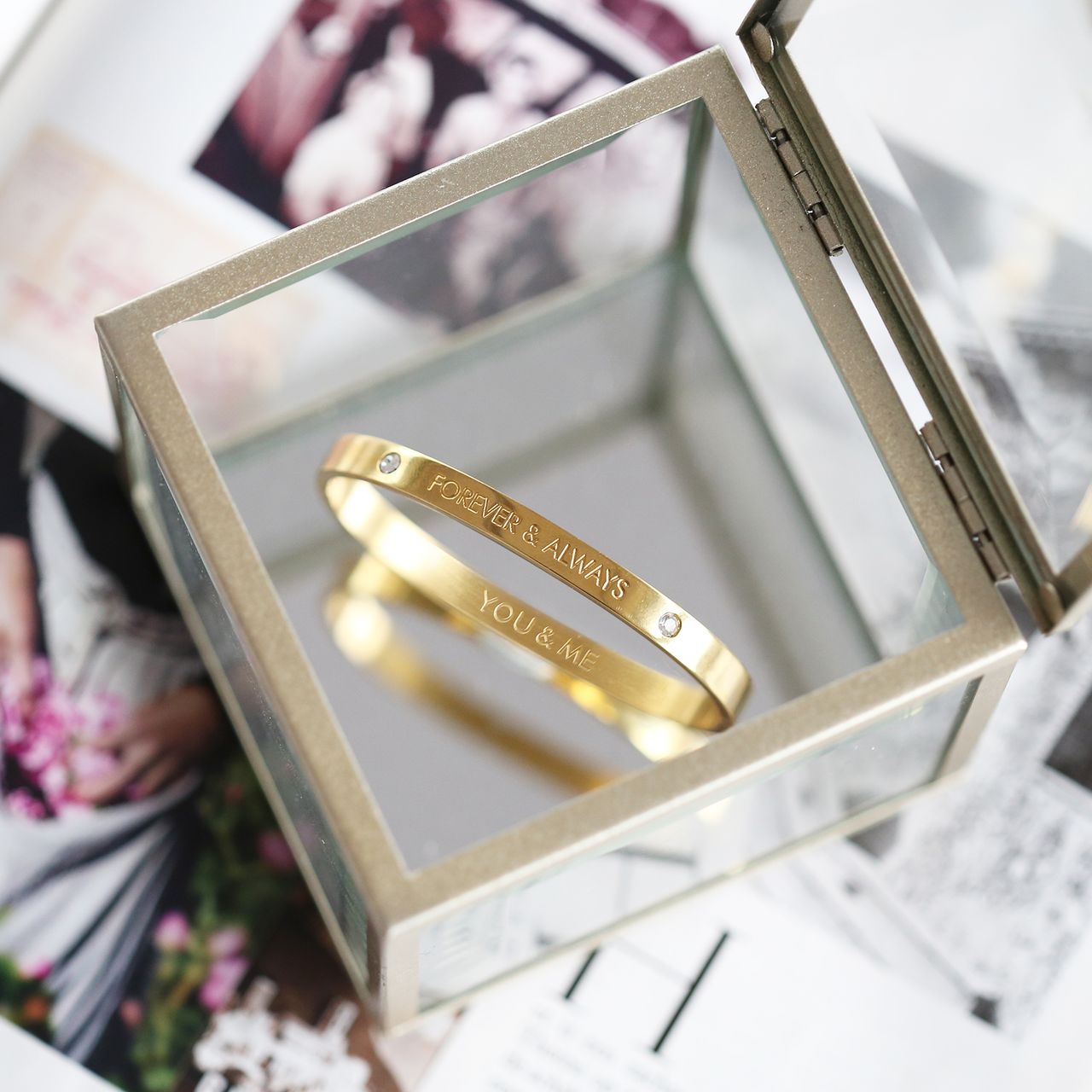 Guess stalen goldplated bangle met kristal voor dames