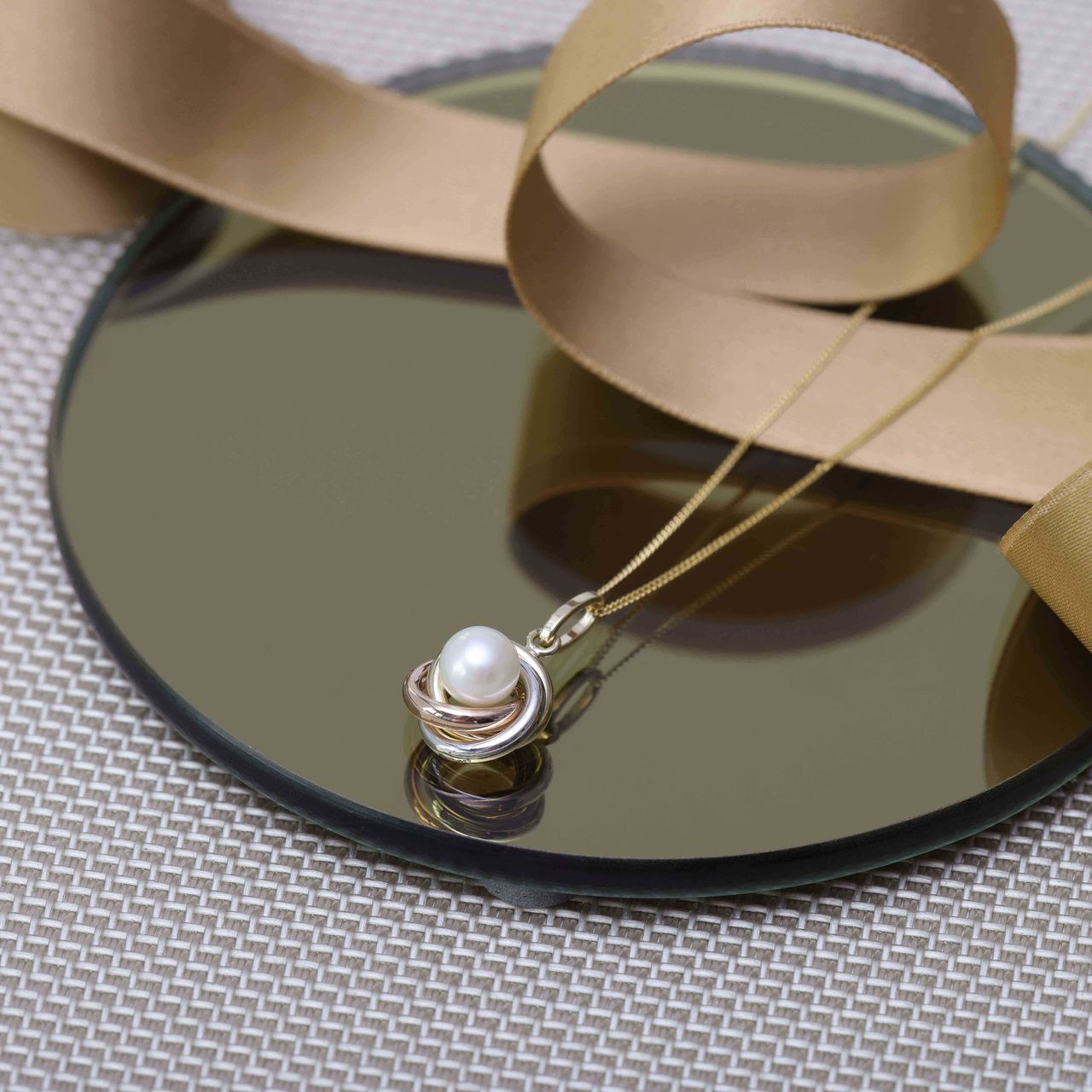 9 Karaat tricolor ketting met hanger knoop parel