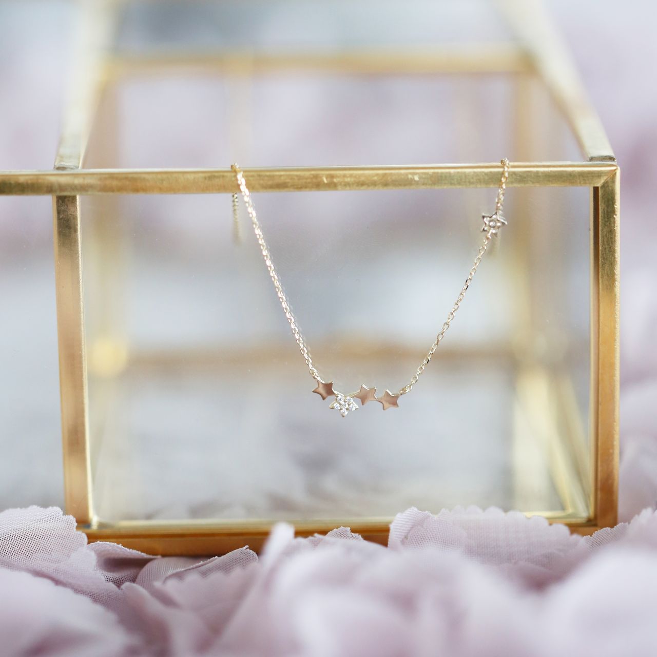 14 Karaat geelgouden ketting sterren met zirkonia