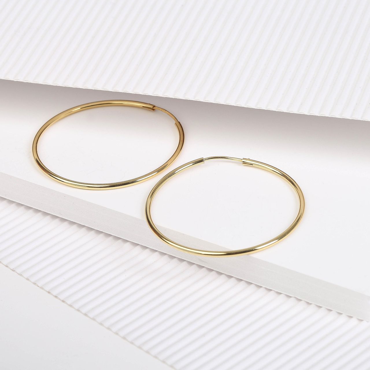 Zilveren oorringen goldplated 50mm voor dames