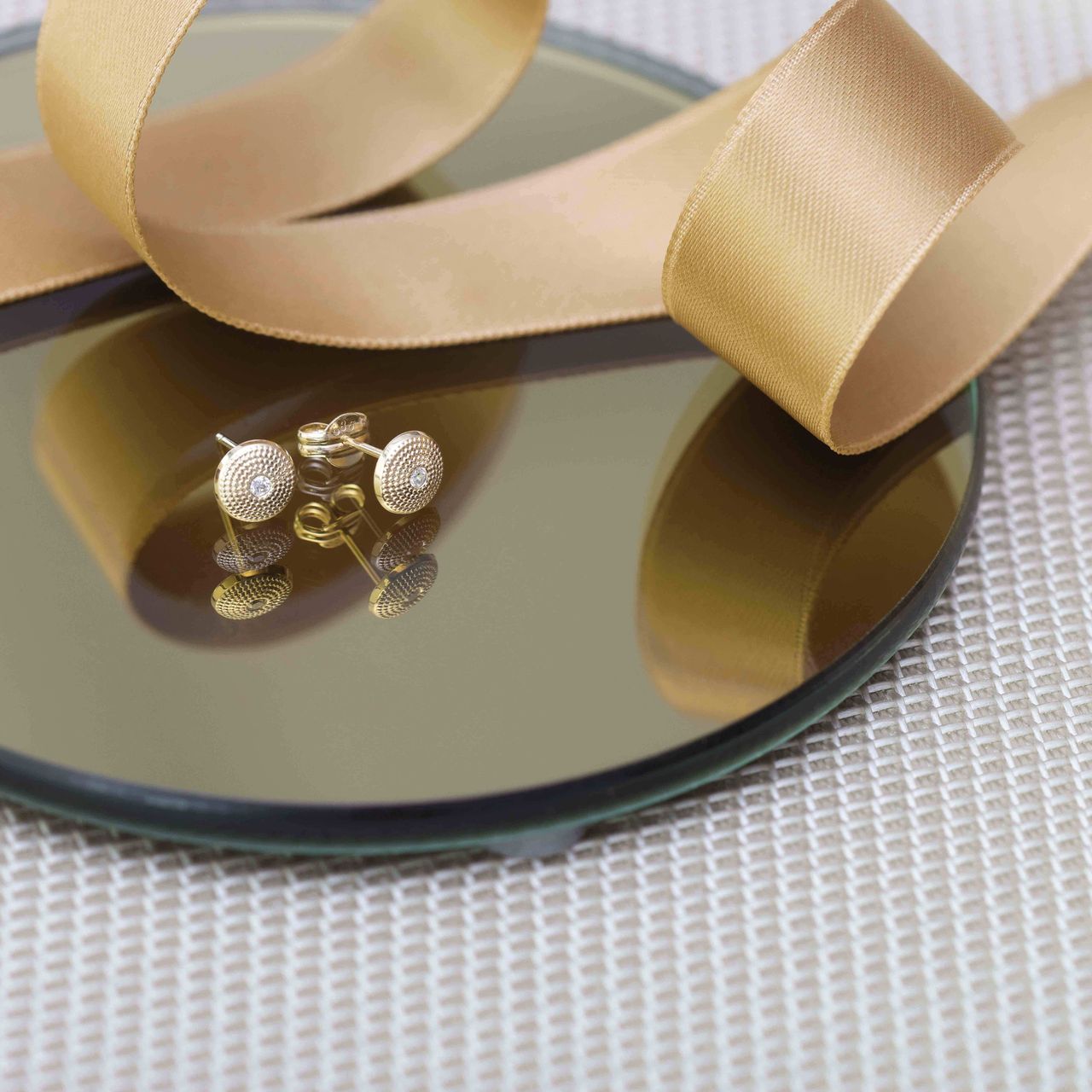 Runde Ohrringe aus 585 Gelbgold mit Zirkonia