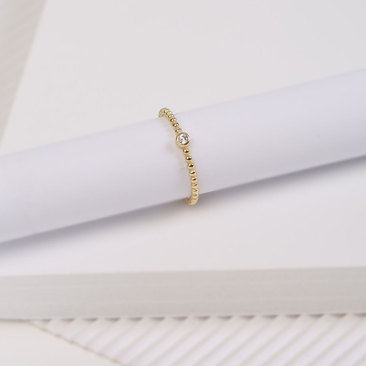 Zilveren ring goldplated bolletjes met zirkonia