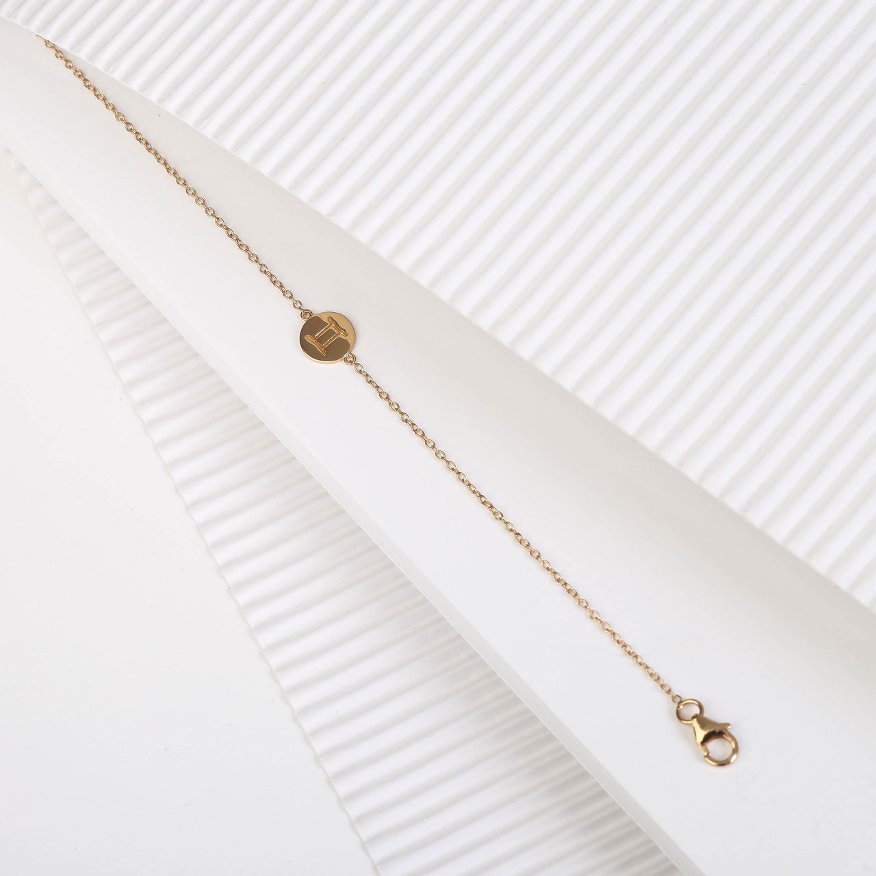 Zilveren goldplated bedelarmband met sterrenbeeldhanger voor dames