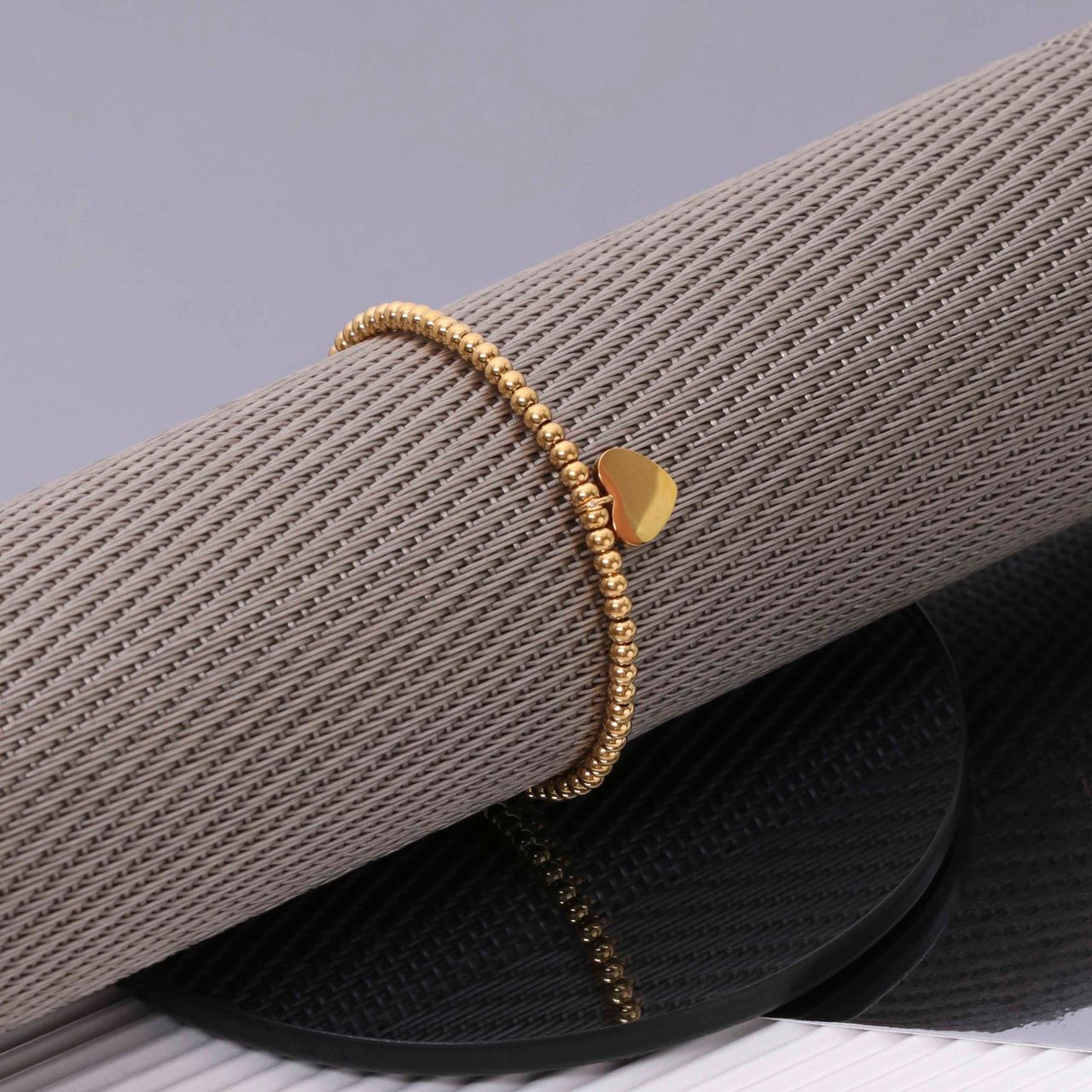 Gerecycleerd stainless steel armband gold bol/hart