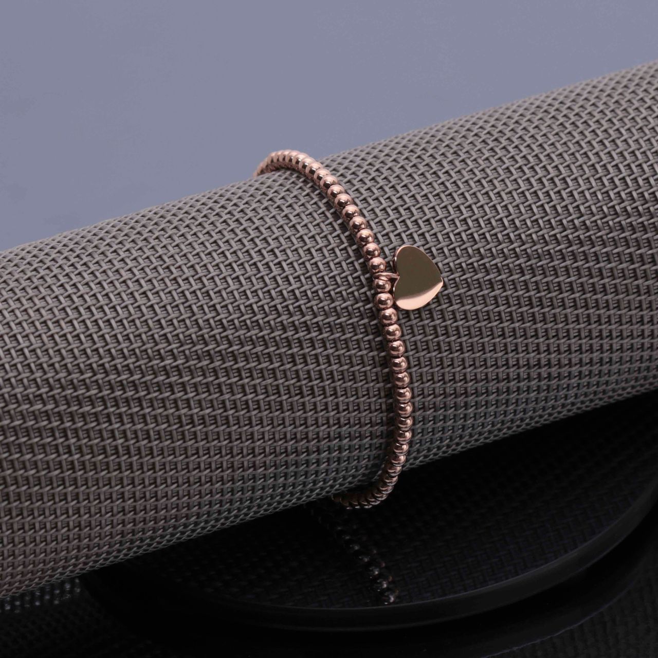 Stainless steel roséplated fantasiearmband met hanger hart voor dames