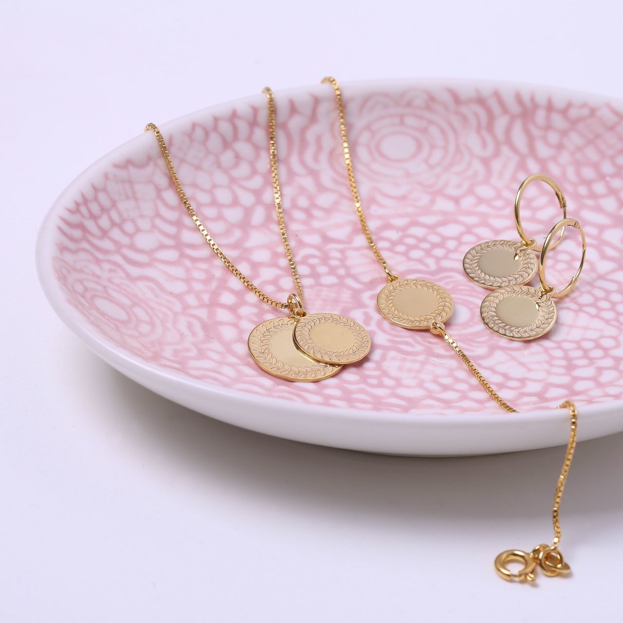 Zilveren oorbellen goldplated Romeinse krans