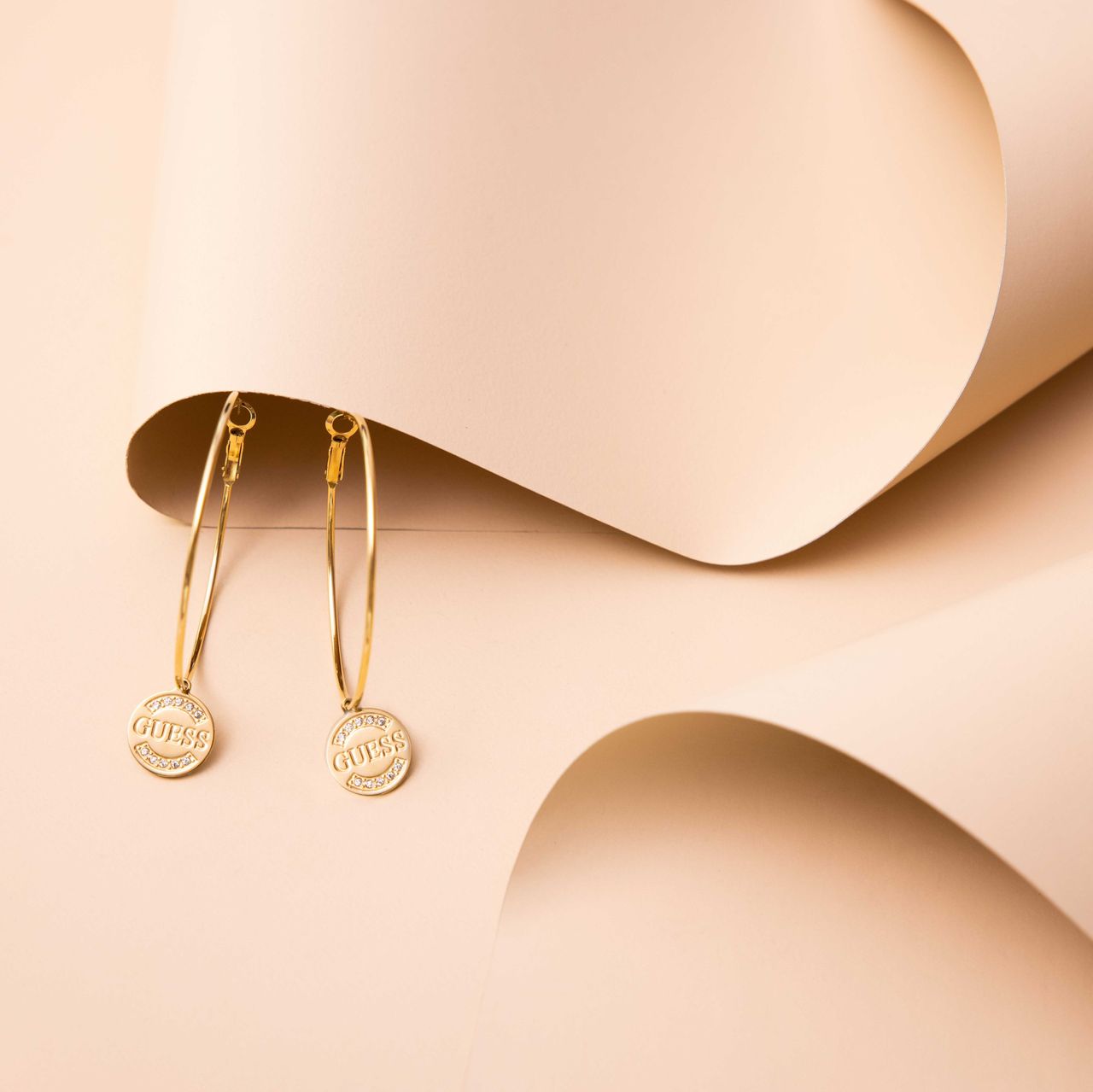 Guess-Ohrringe, Edelstahl, vergoldet, GUESS-Logo, 50 mm