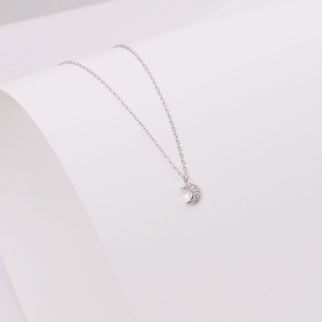 Zilveren ketting maan met zirkonia