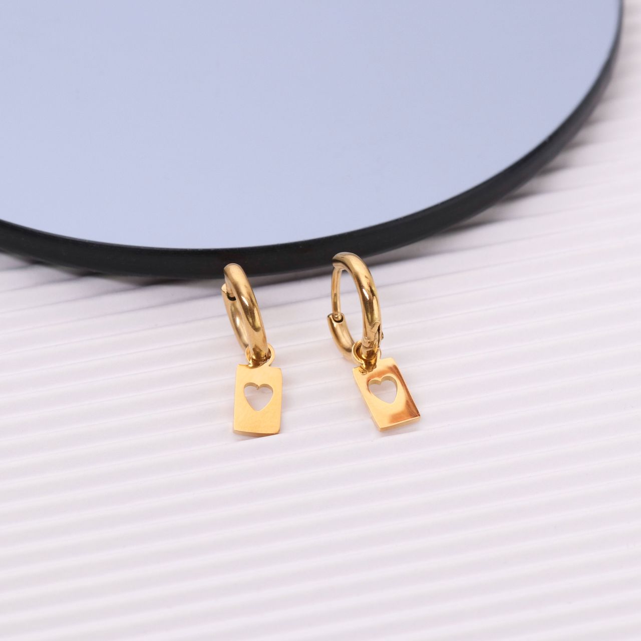 Stalen oorringen goldplated bar open hart