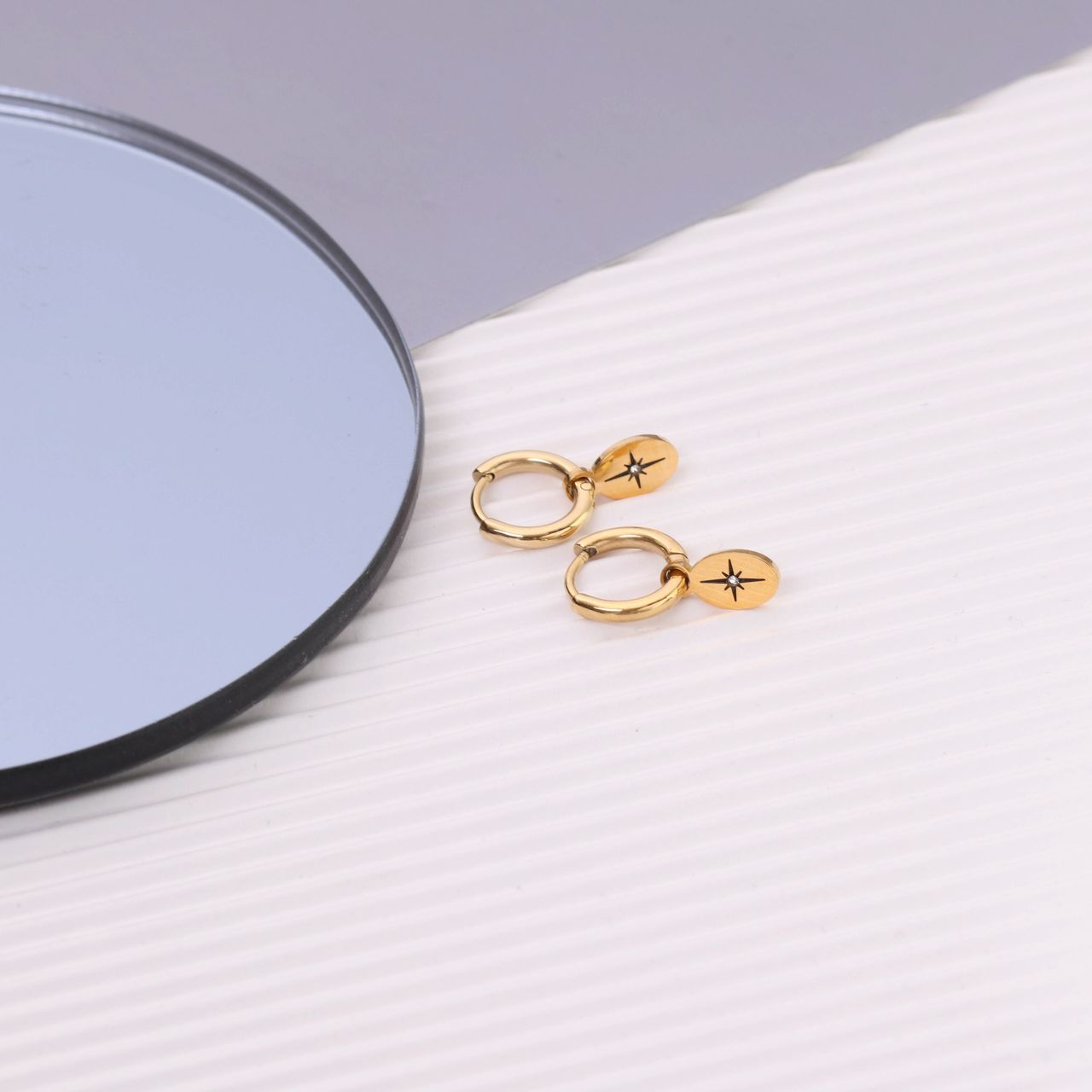 Stainless steel goldplated oorringen met hanger ster met zirkonia voor dames