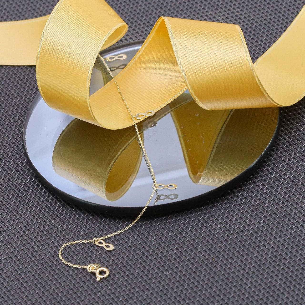 9 Karaat enkelband met infinity bedels