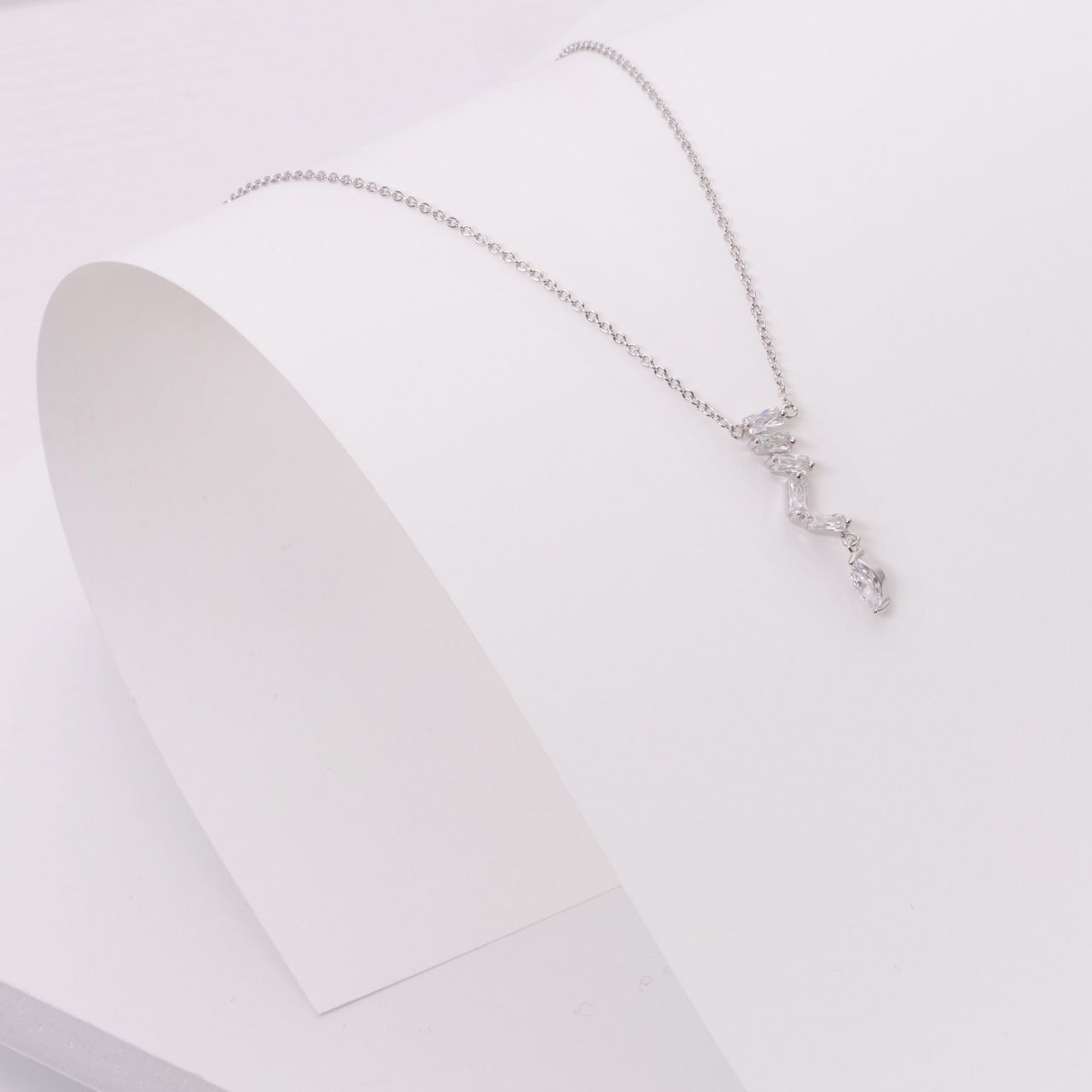 Zilveren ketting met hanger baguette