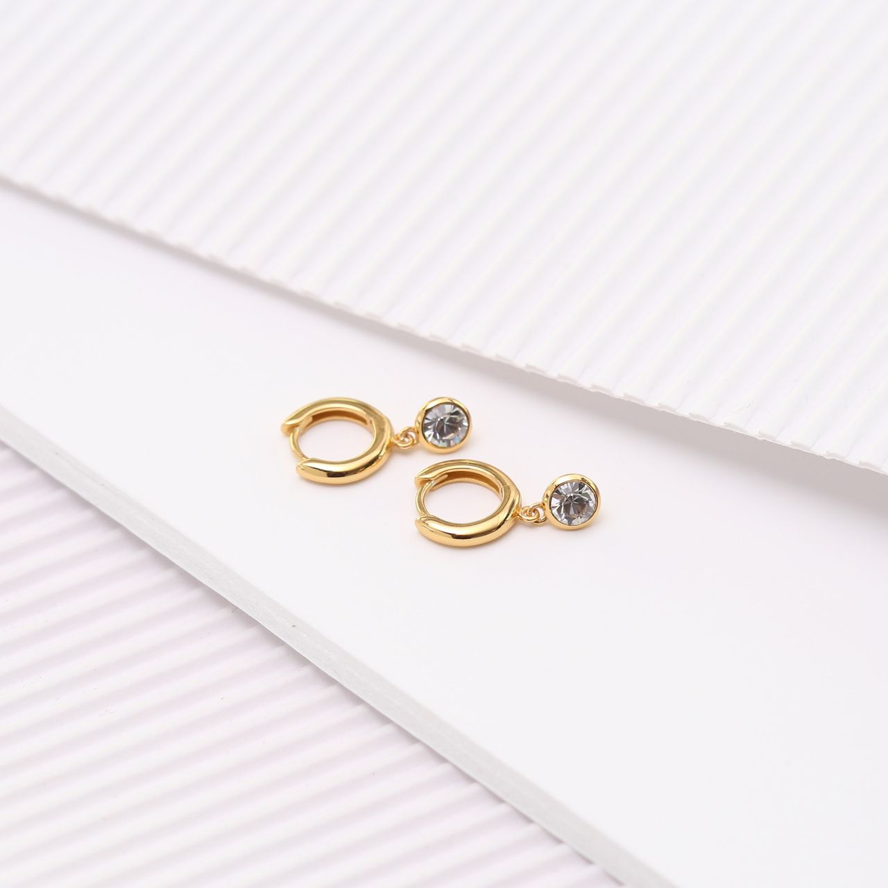 Zilveren oorringen gold kristal wit