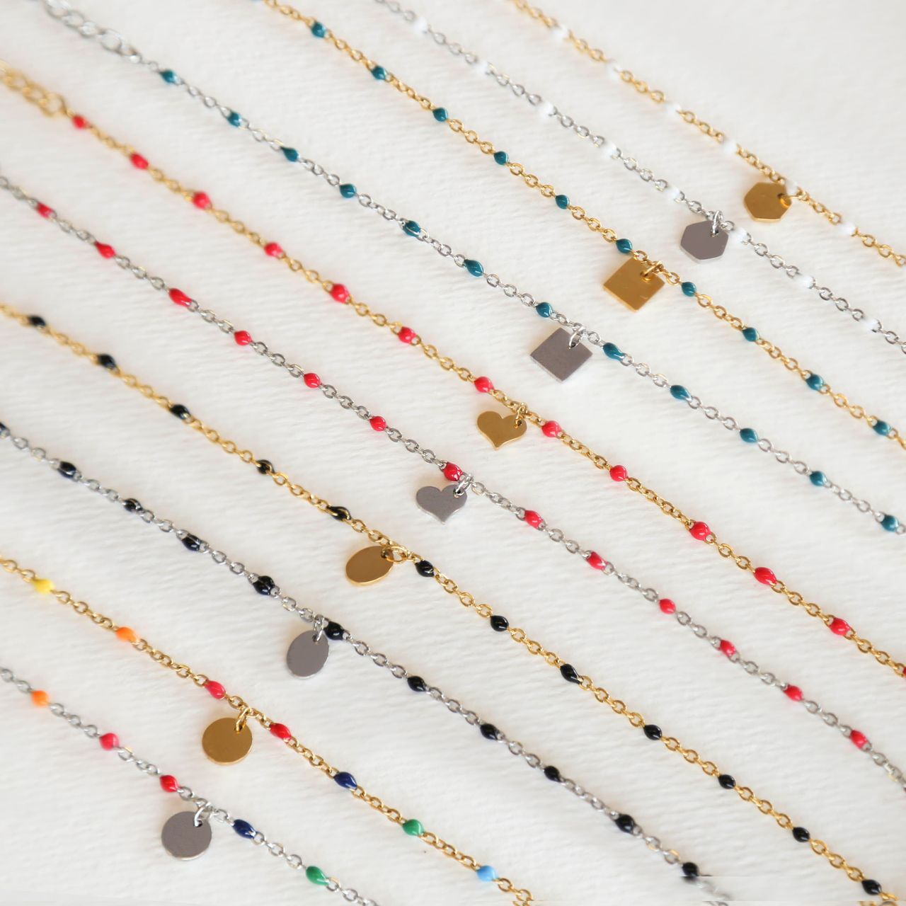 Stainless steel goldplated kralenarmband hart fuchsia emaille voor dames