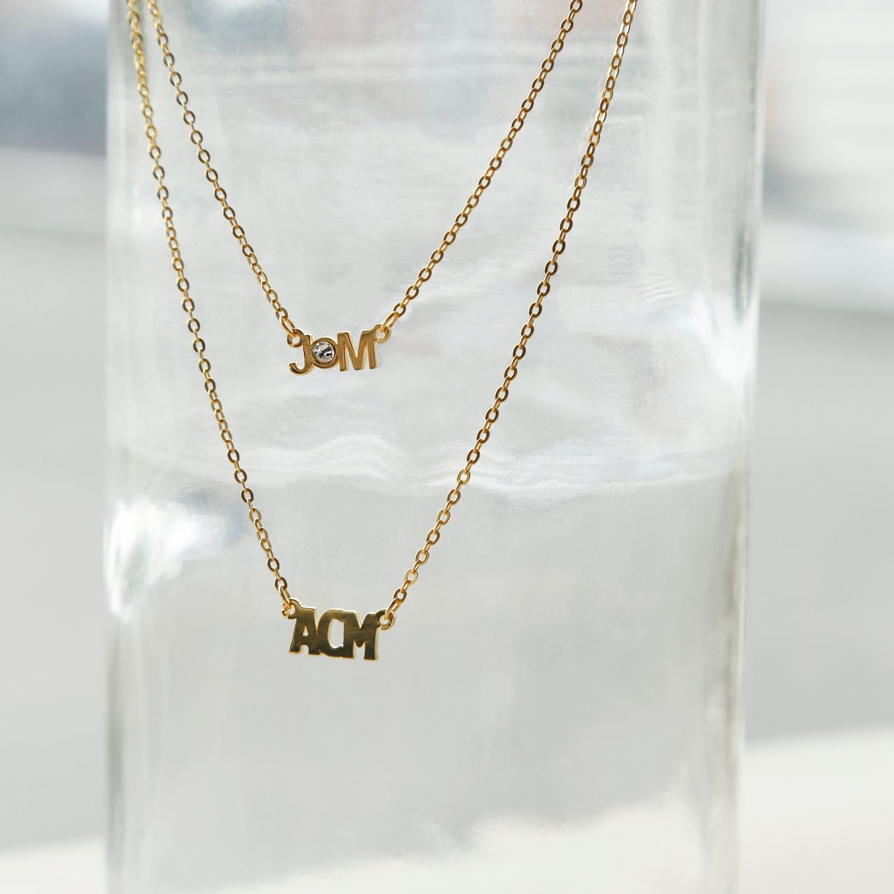 Zilveren goldplated naamketting met zirkonia voor dames