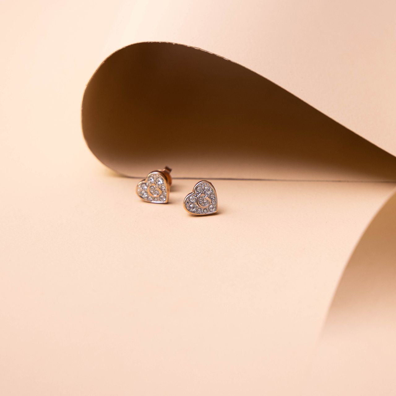 Guess stainless steel roséplated oorknoppen hart met kristal voor dames