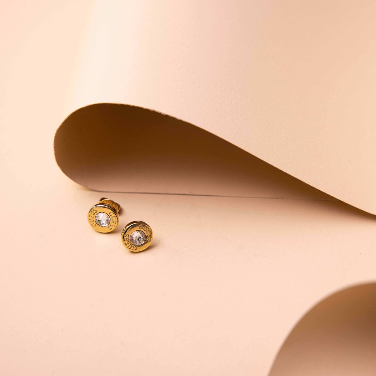 Guess stainless steel goldplated oorknoppen met kristal voor dames