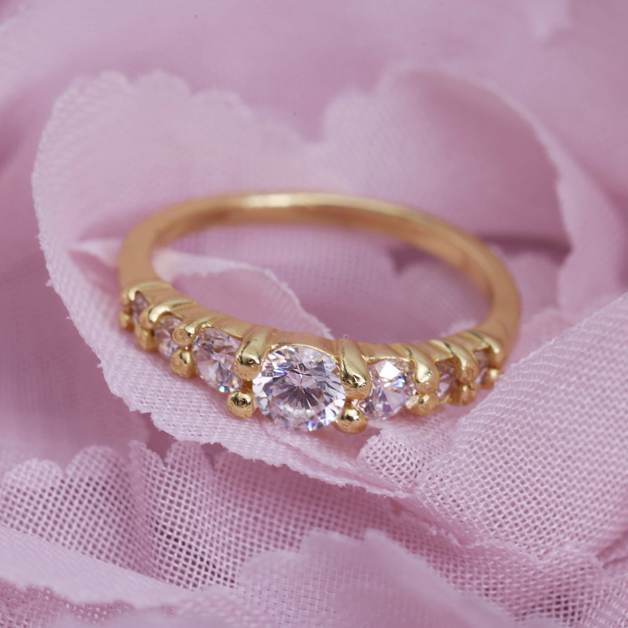 Zilveren goldplated kinderring met witte zirkonia