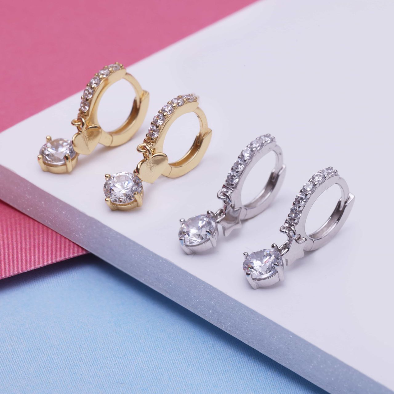Zilveren goldplated kinderoorringen hart met zirkonia