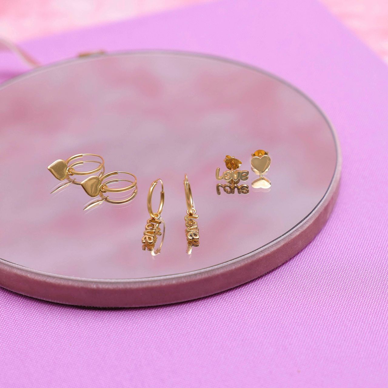 Zilveren goldplated oorknop heart