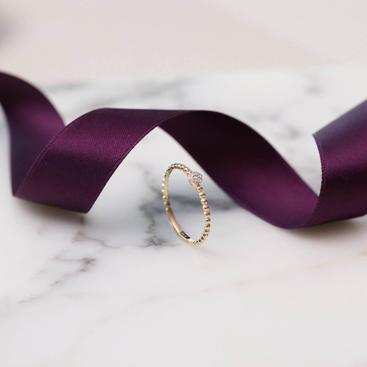Ring, 585 Gelbgold, 7 Diamanten 0,025 ct, Kugeln.