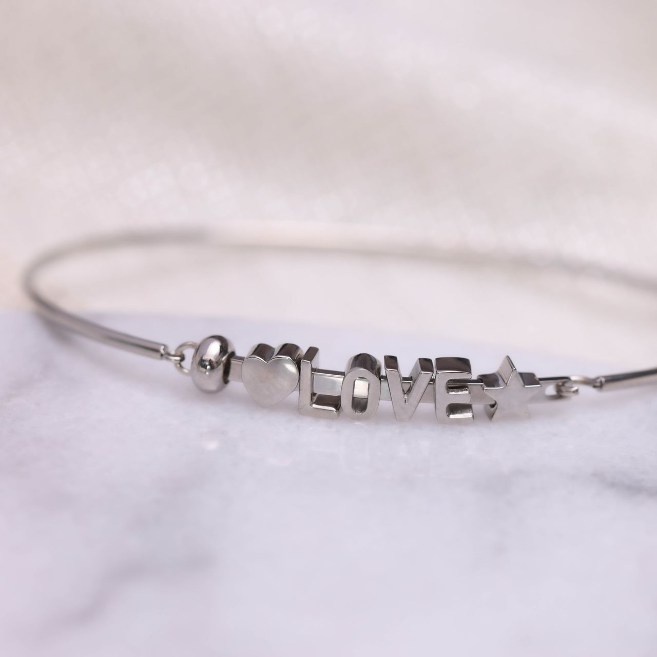 Gerecycled stainless steel charm letter