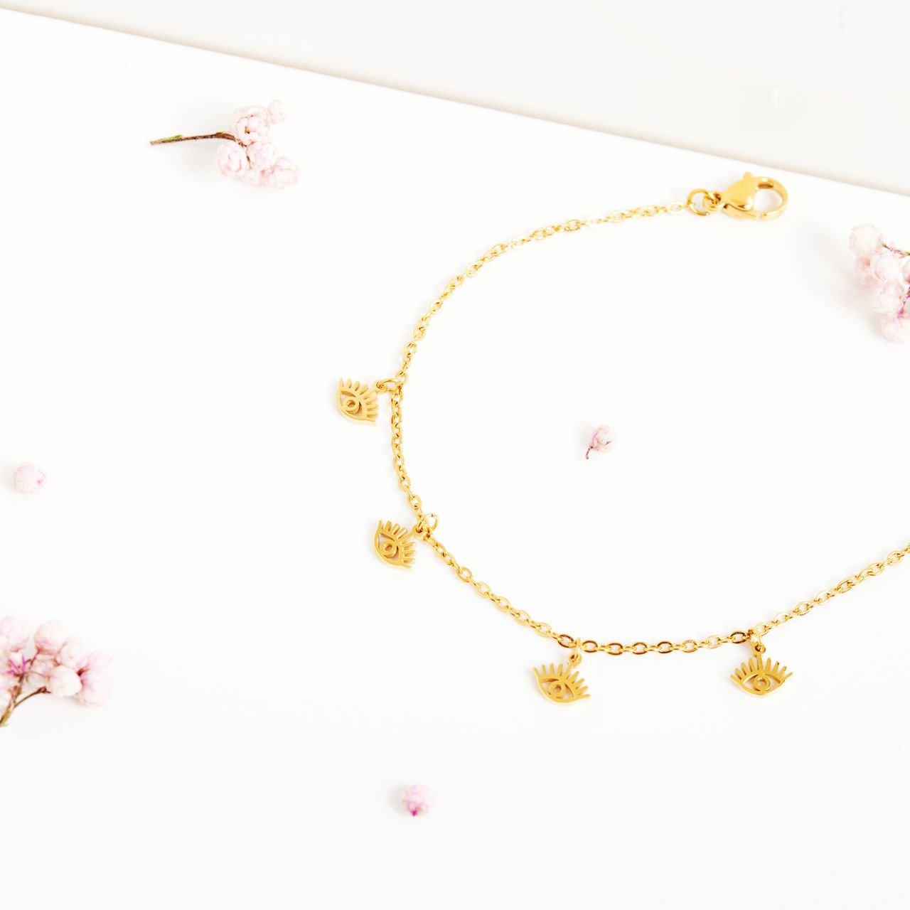 Stalen goldplated armband met hanger oogjes