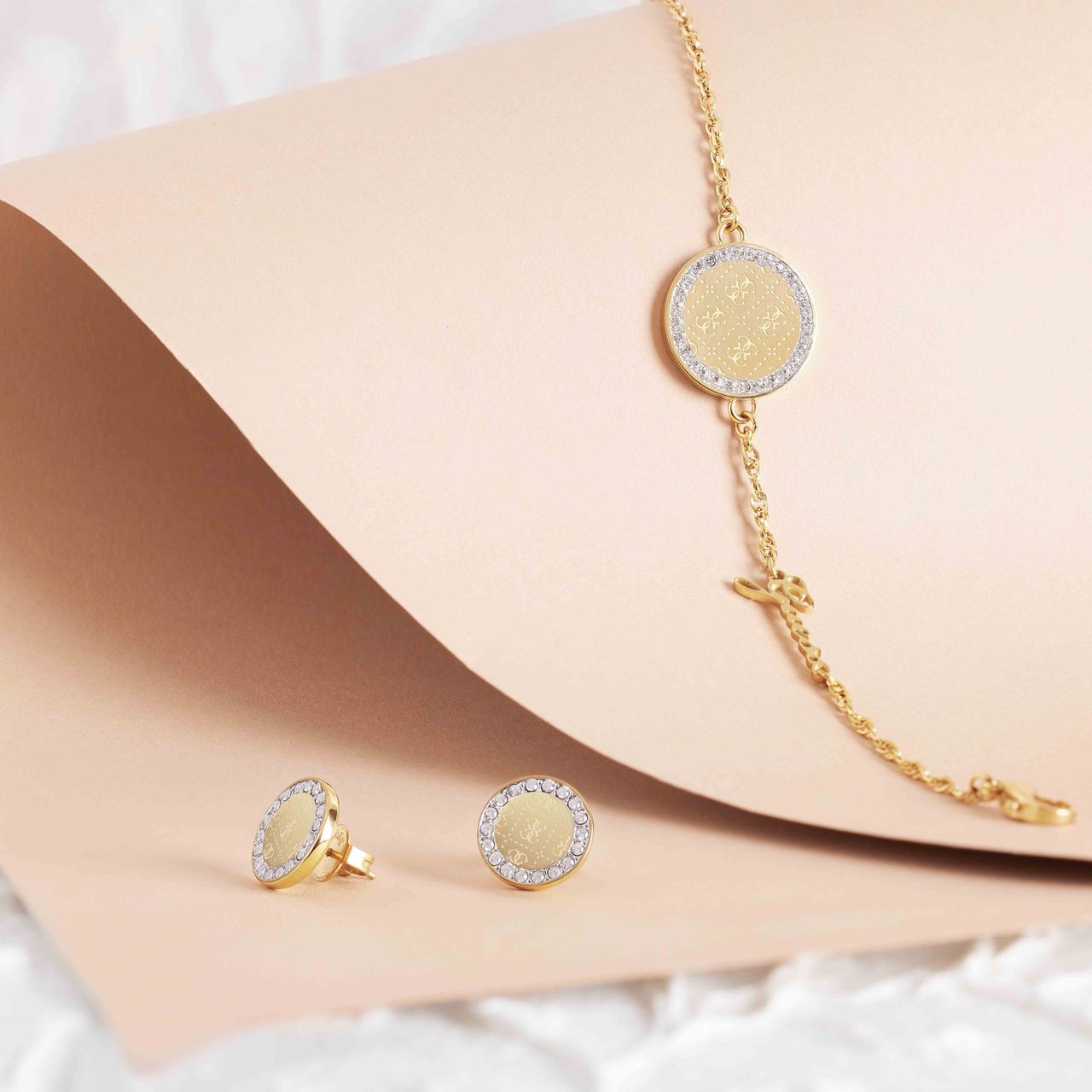 Guess stainless steel goldplated oorknoppen met kristal voor dames