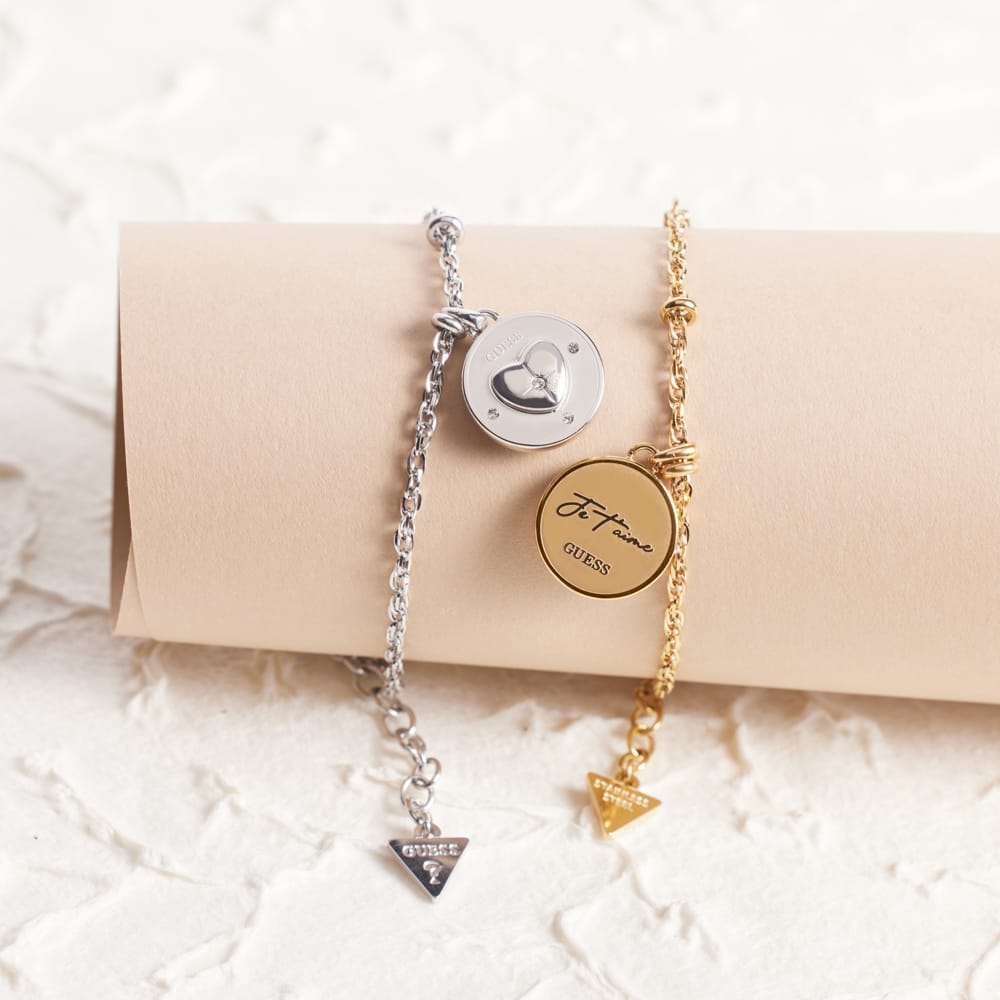 Guess stainless steel goldplated bedelarmband met kristal voor dames