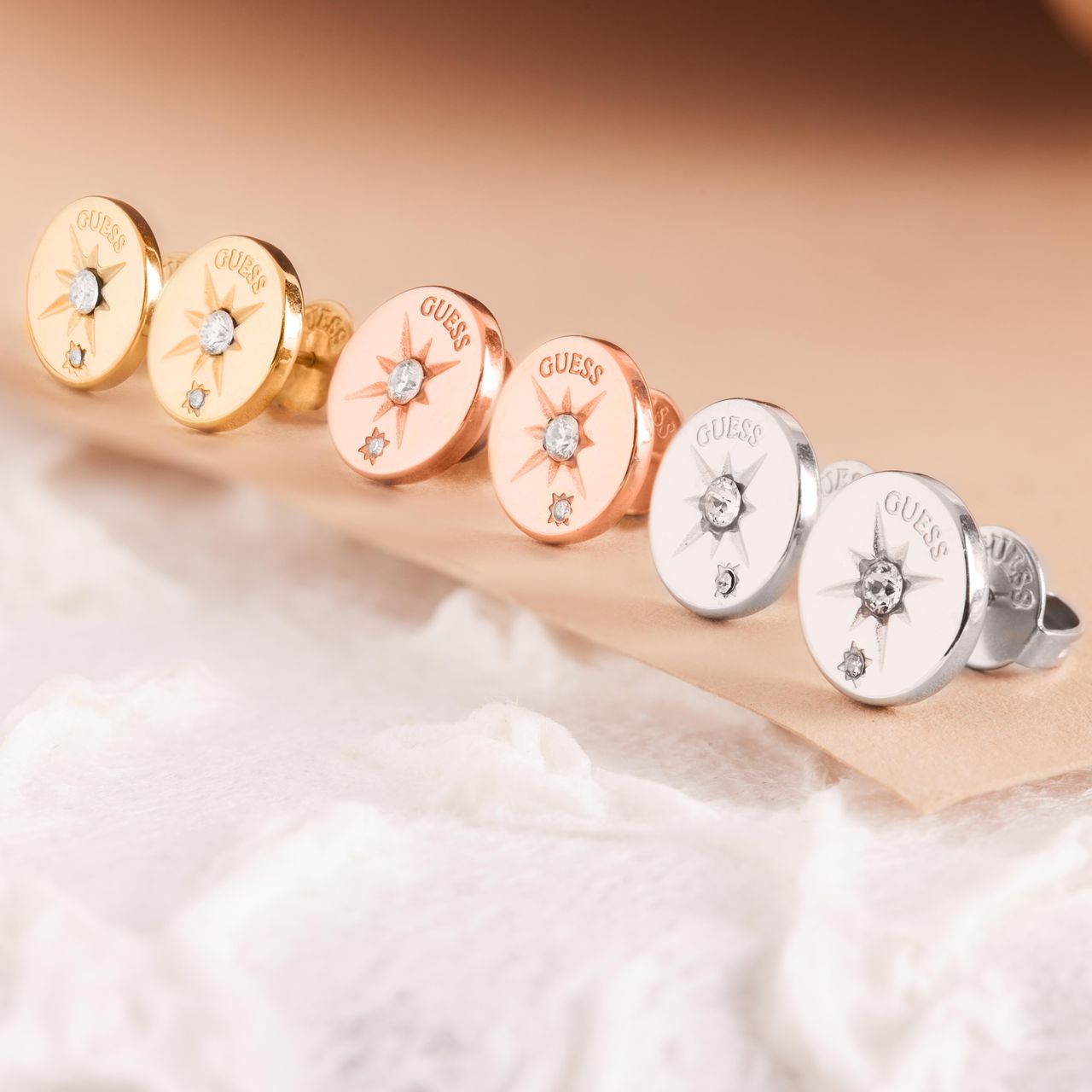 Guess stalen goldplated oorknoppen met kristal voor dames