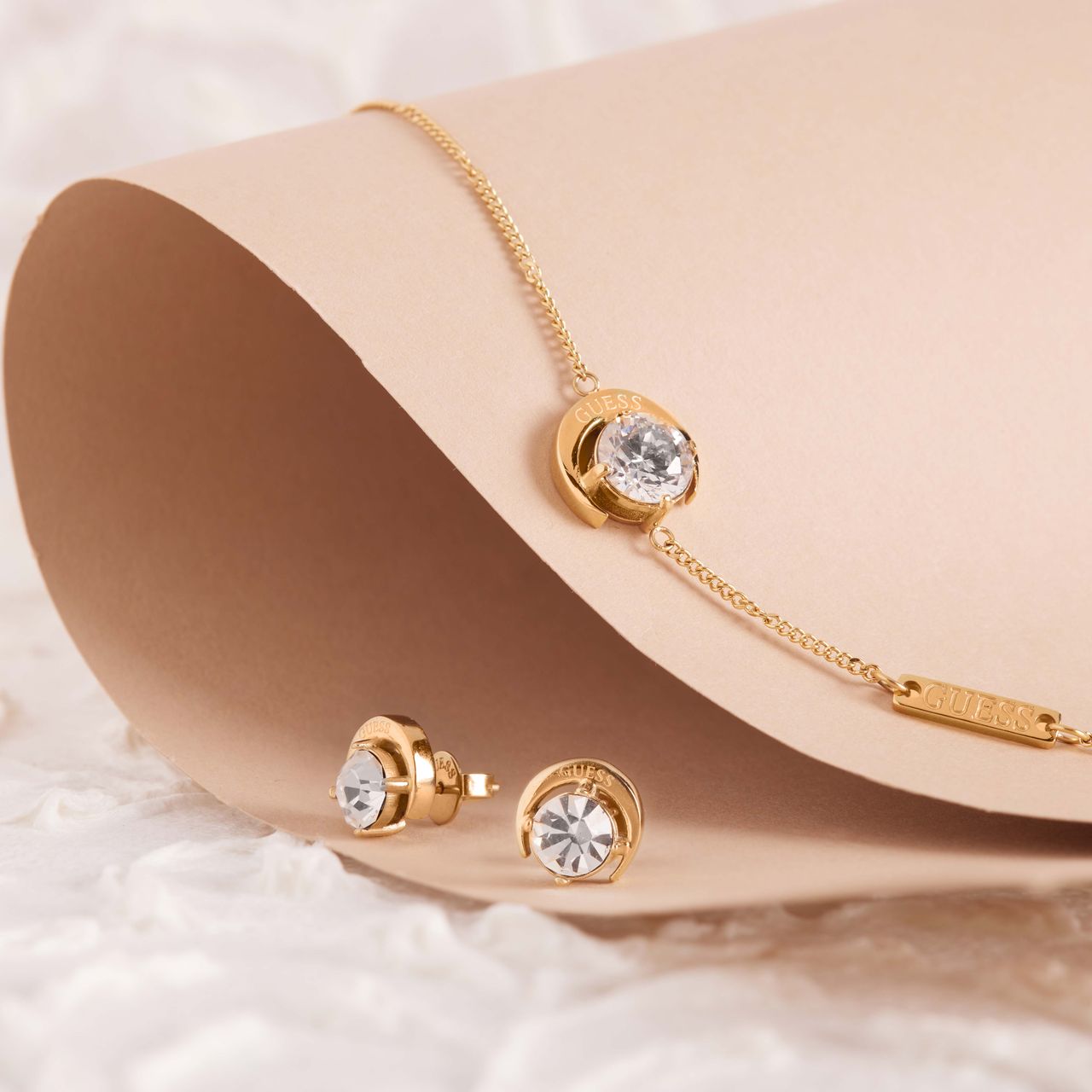 Guess stainless steel goldplated oorknoppen met kristal voor dames