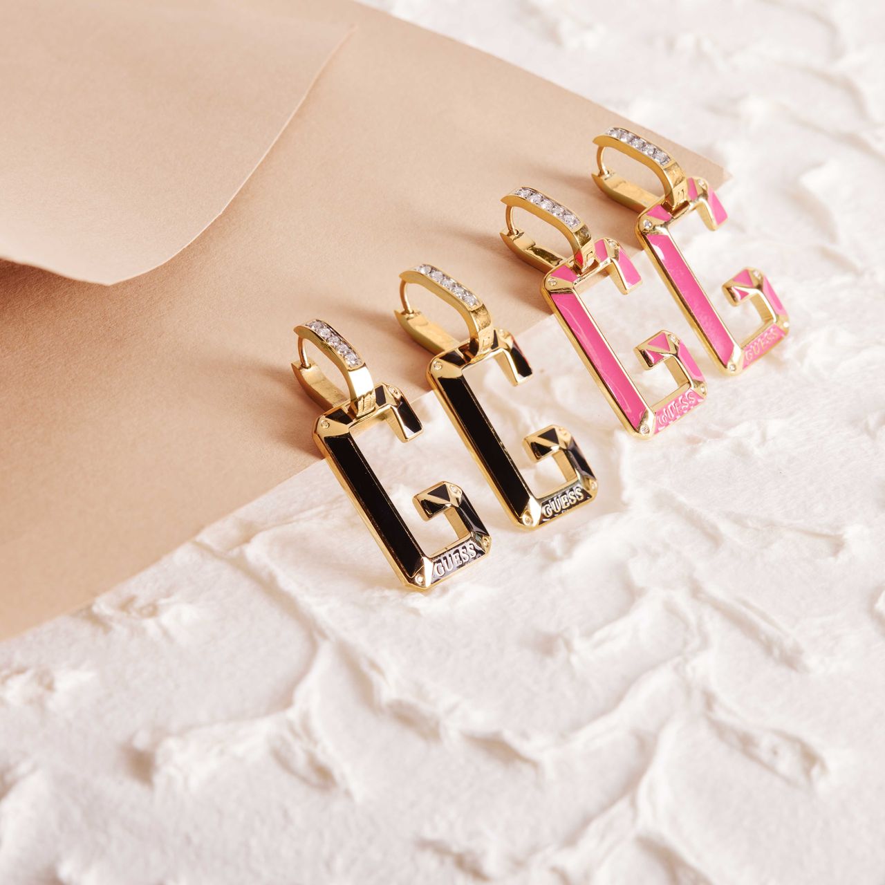 Guess stalen goldplated oorhangers met kristal voor dames