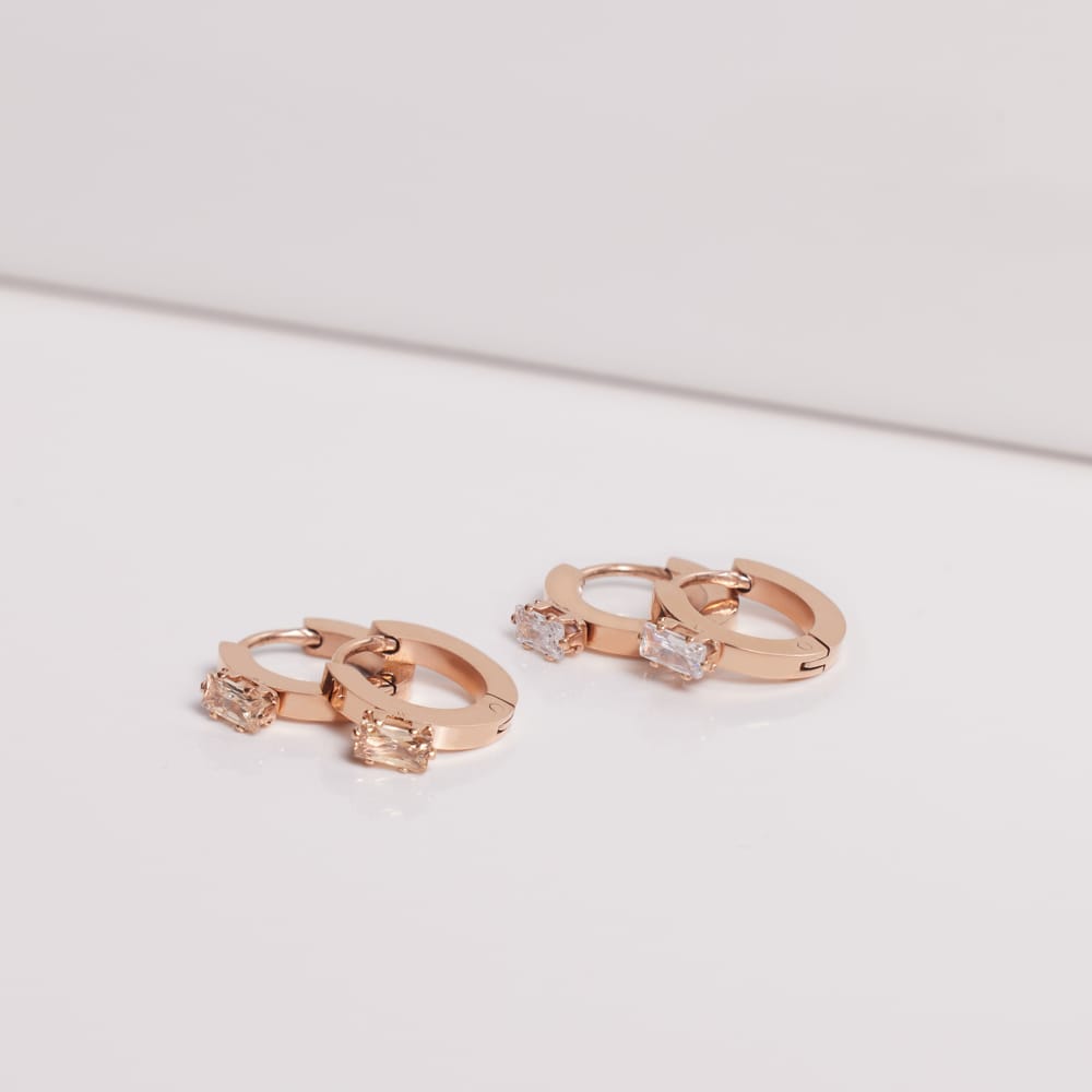 Stalen roseplated oorringen wit