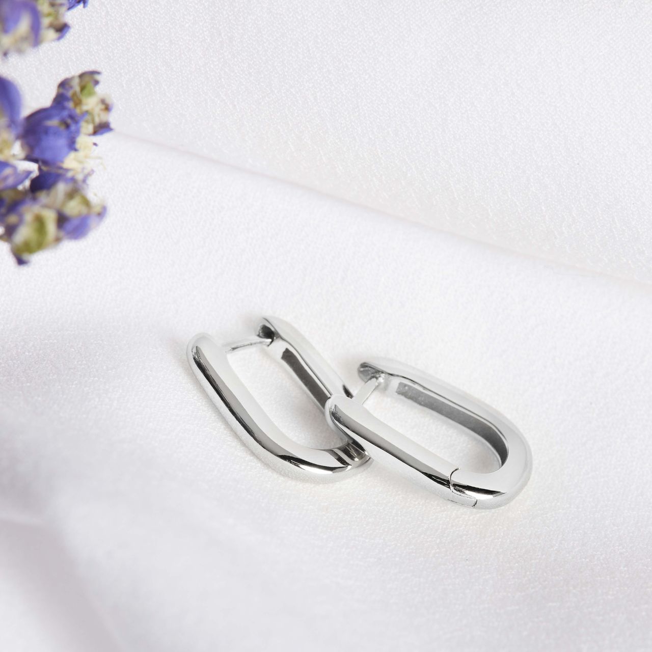 Zilveren ovalen oorringen rhodiumplated voor dames