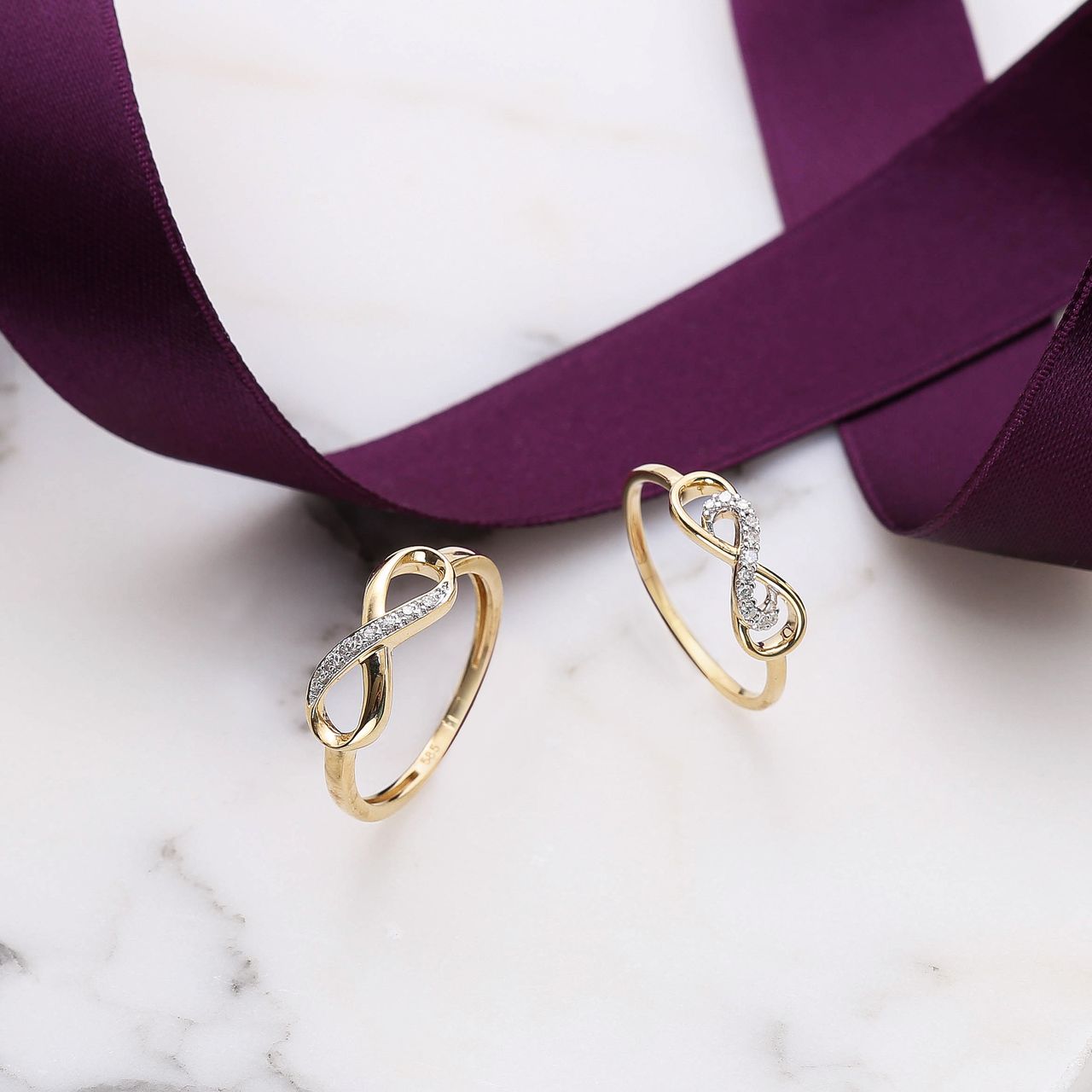 14K geelgouden ring infinity 7 diamanten 0,02ct