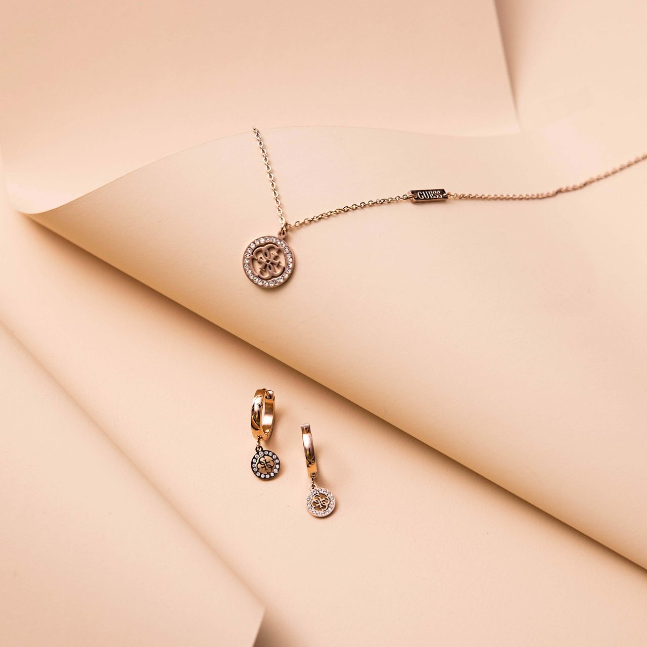Guess-Ohrringe, Edelstahl, rotvergoldet, 4G-Logo, 15 mm