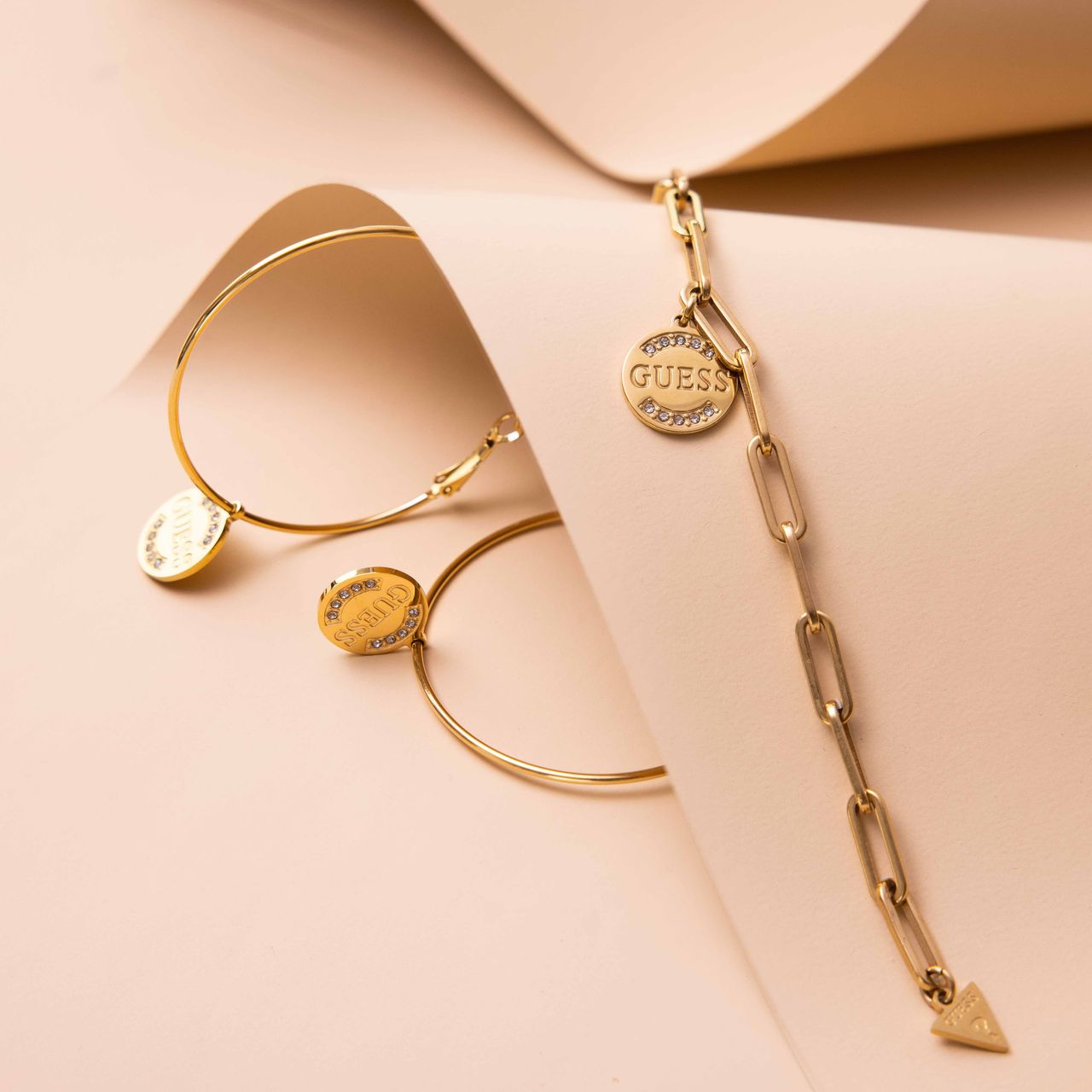 Guess-Ohrringe, Edelstahl, vergoldet, GUESS-Logo, 50 mm