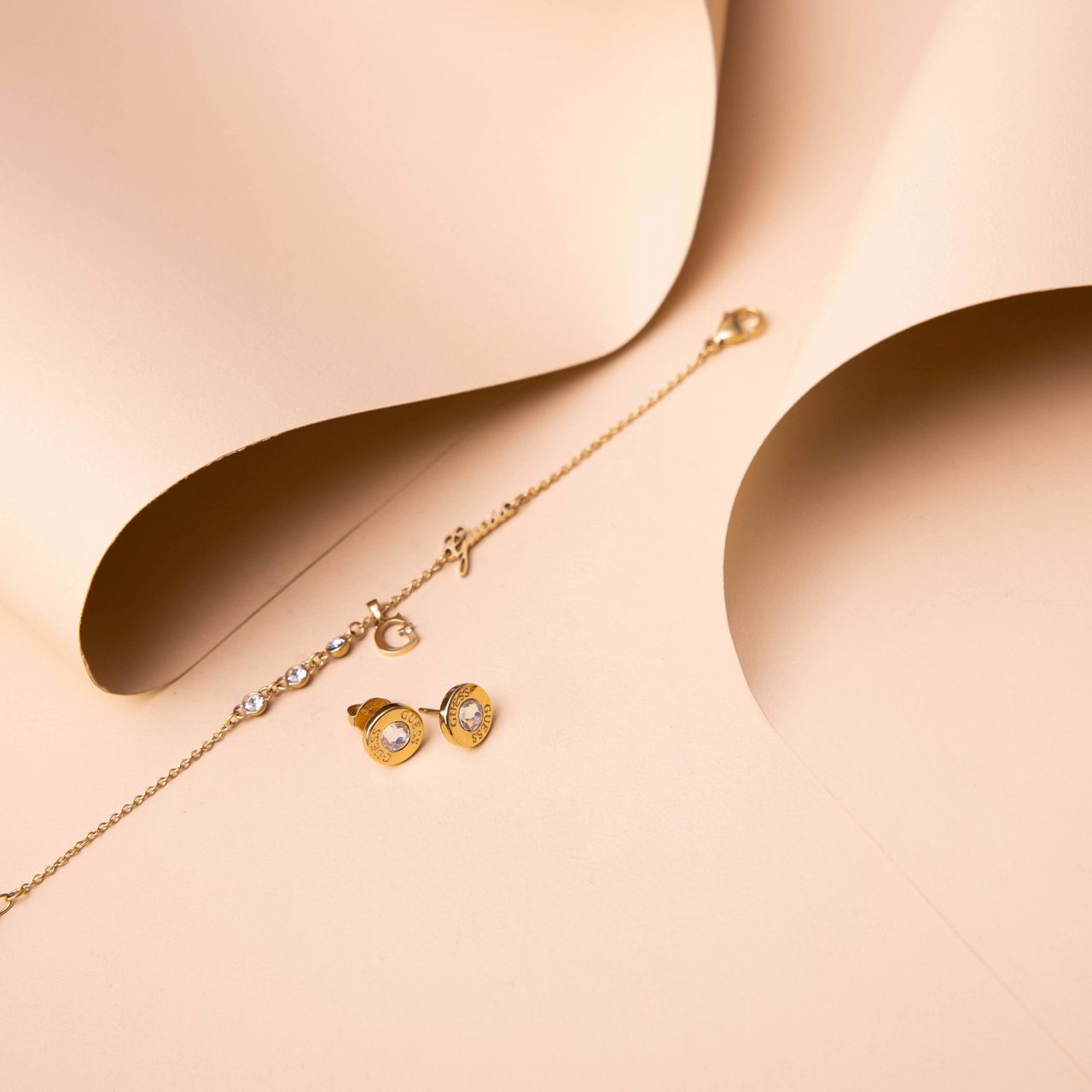 Guess stalen goldplated oorknoppen met kristal voor dames