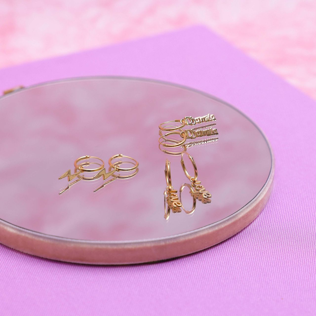 Zilveren goldplated kinderoorringen met letterhanger