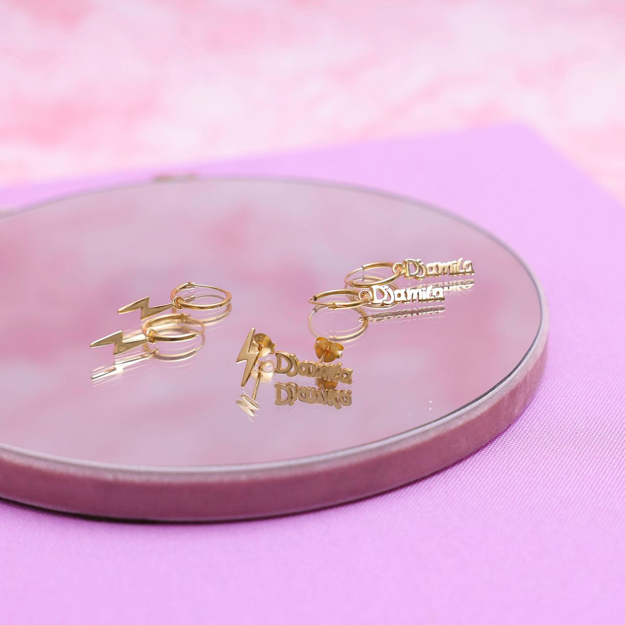 Zilveren goldplated oorknop lightning