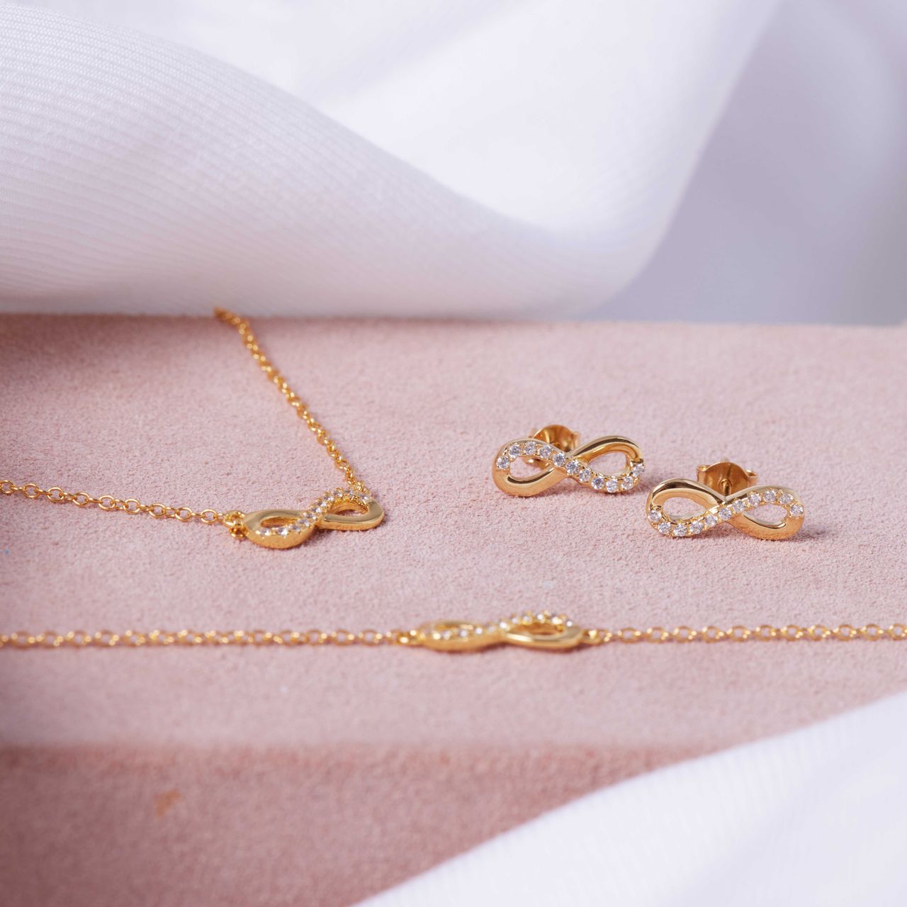 Zilveren goldplated oorknoppen infinity zirkonia voor dames