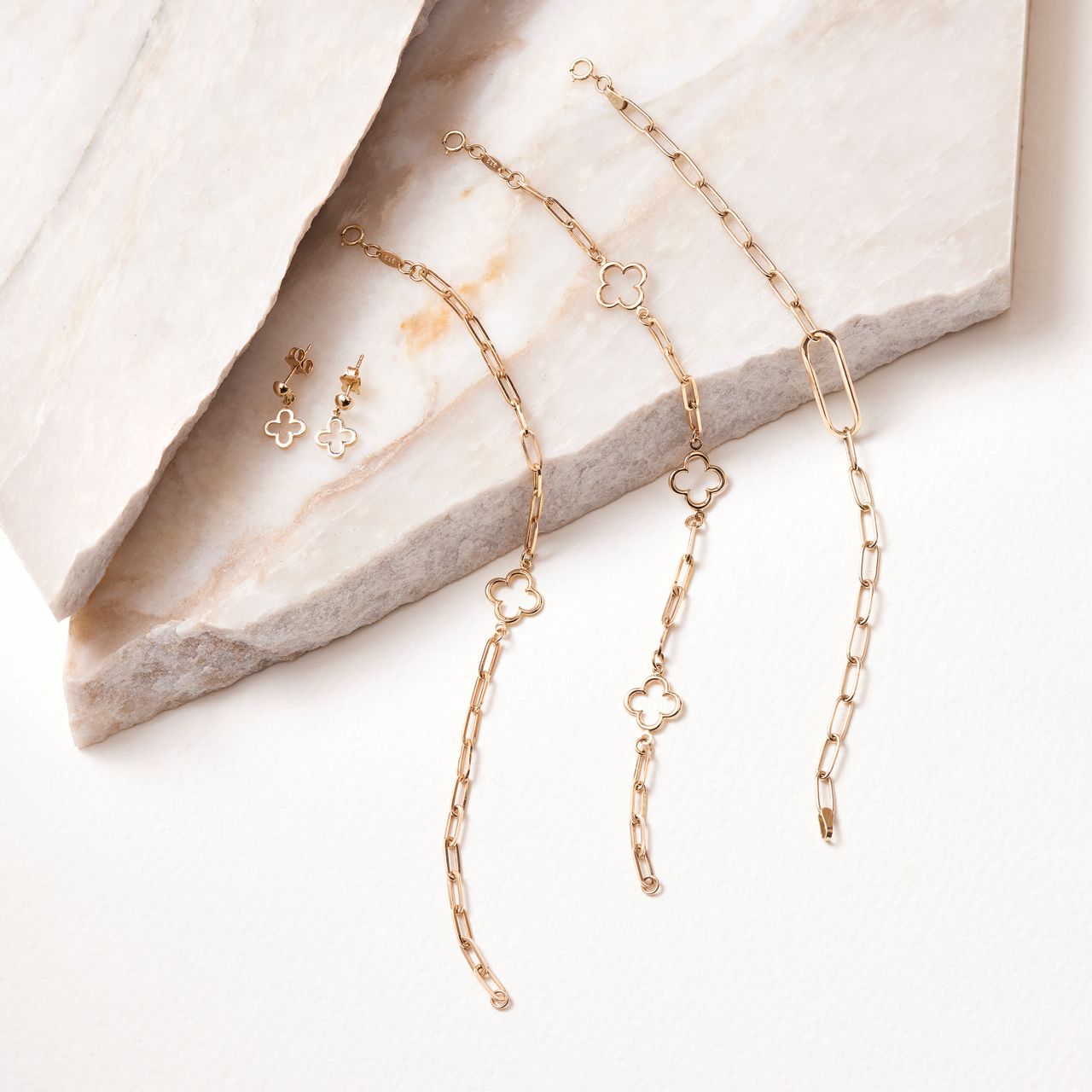 14 Karaat geelgouden armband Paperclip met bloemen