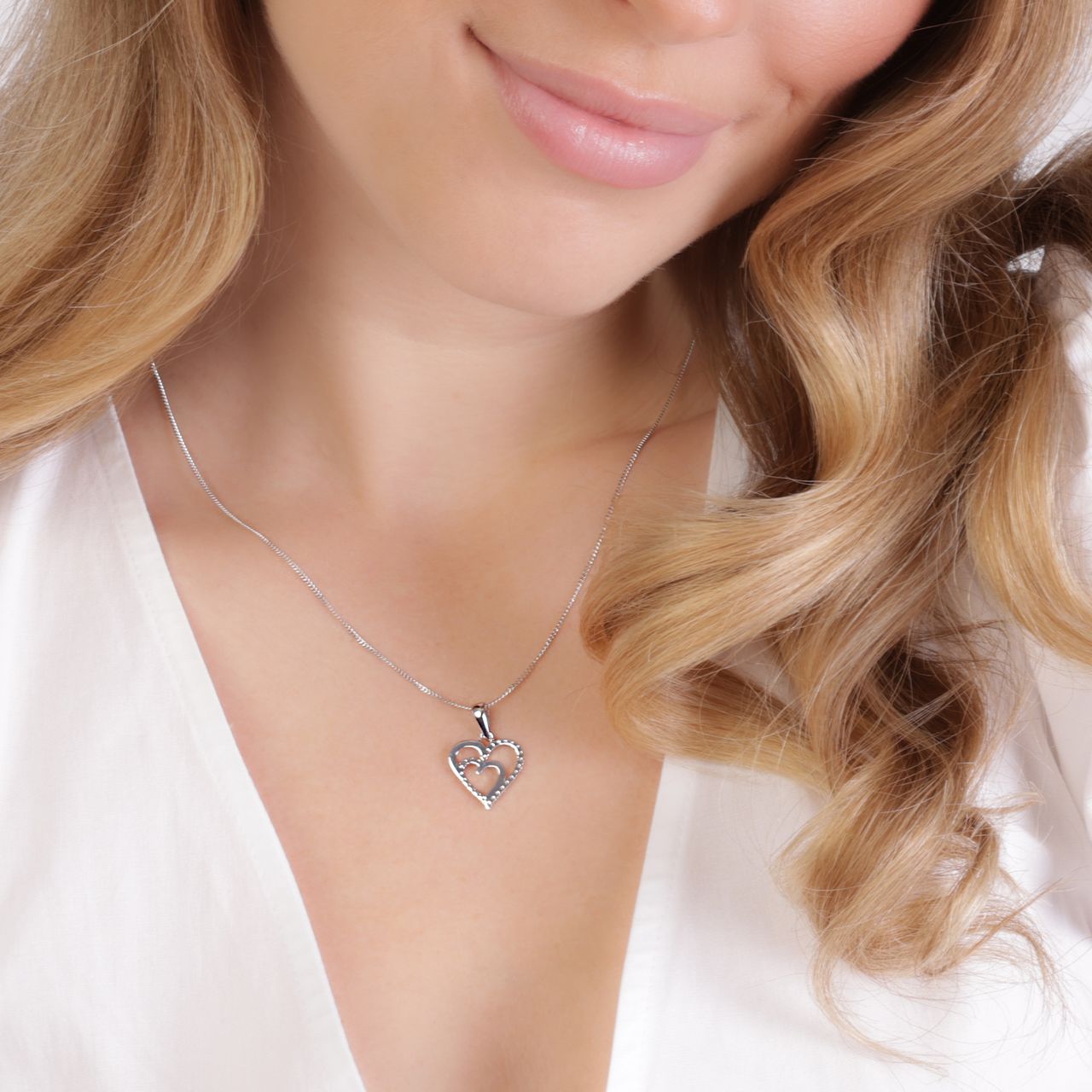 Zilveren ketting en hanger hart met zirkonia